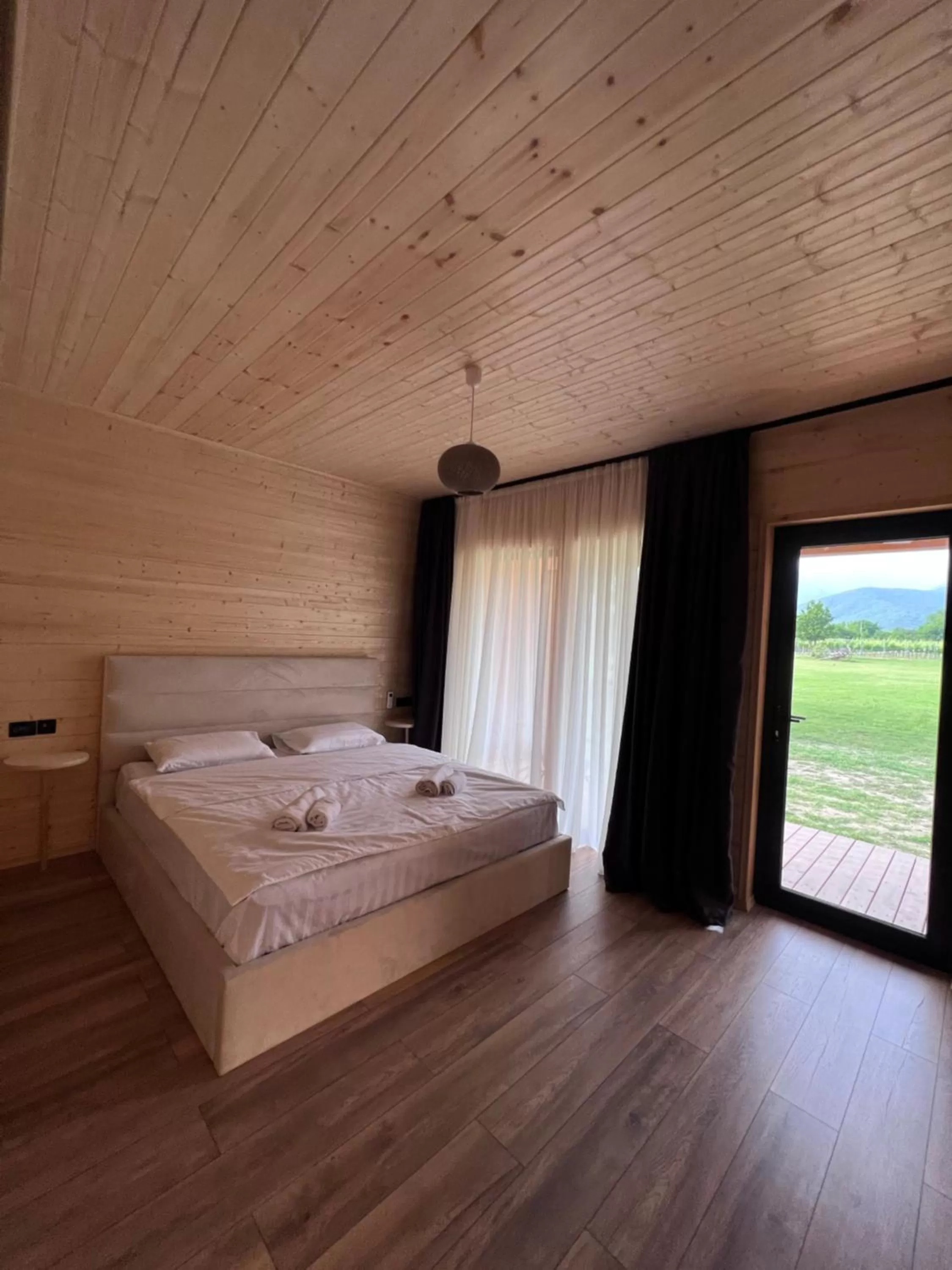 Bed in Chubini Winery & Cabins