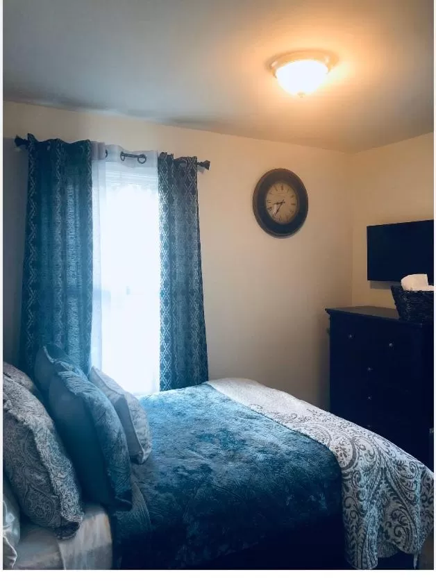 Bed in Naomi’s Bed & Breakfast