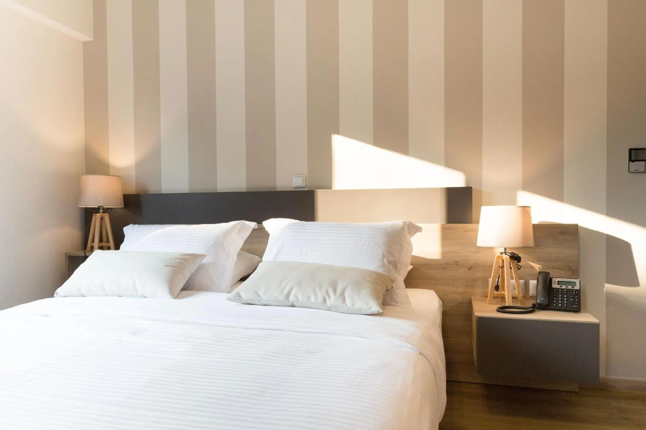 Photo of the whole room, Bed in Hotel @Syngrou Fix