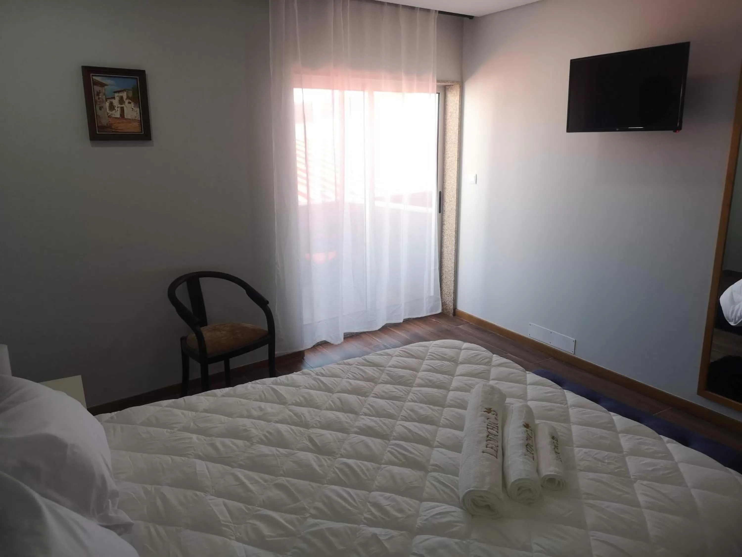 Bed in Leonchic - Guest House