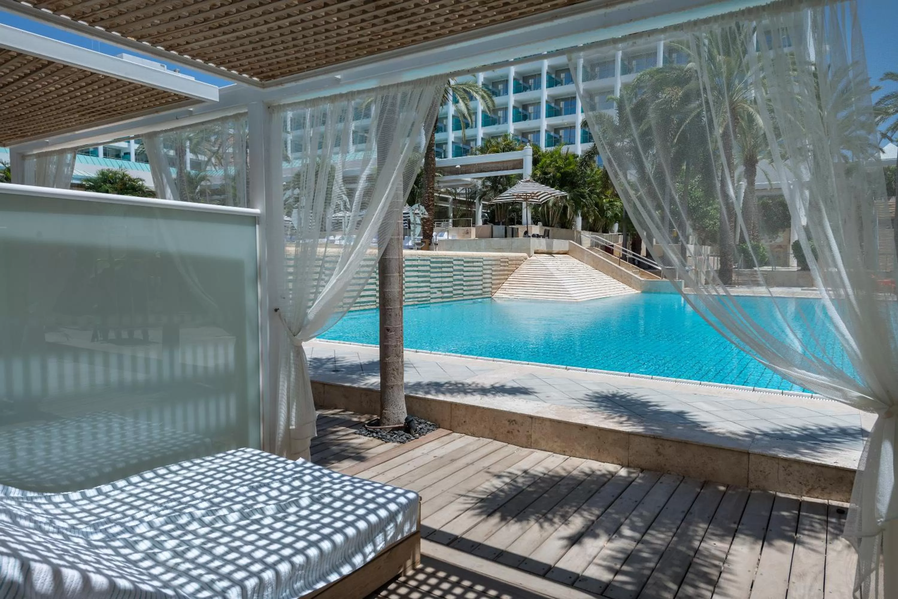 Swimming pool in Yam Suf by Isrotel Collection