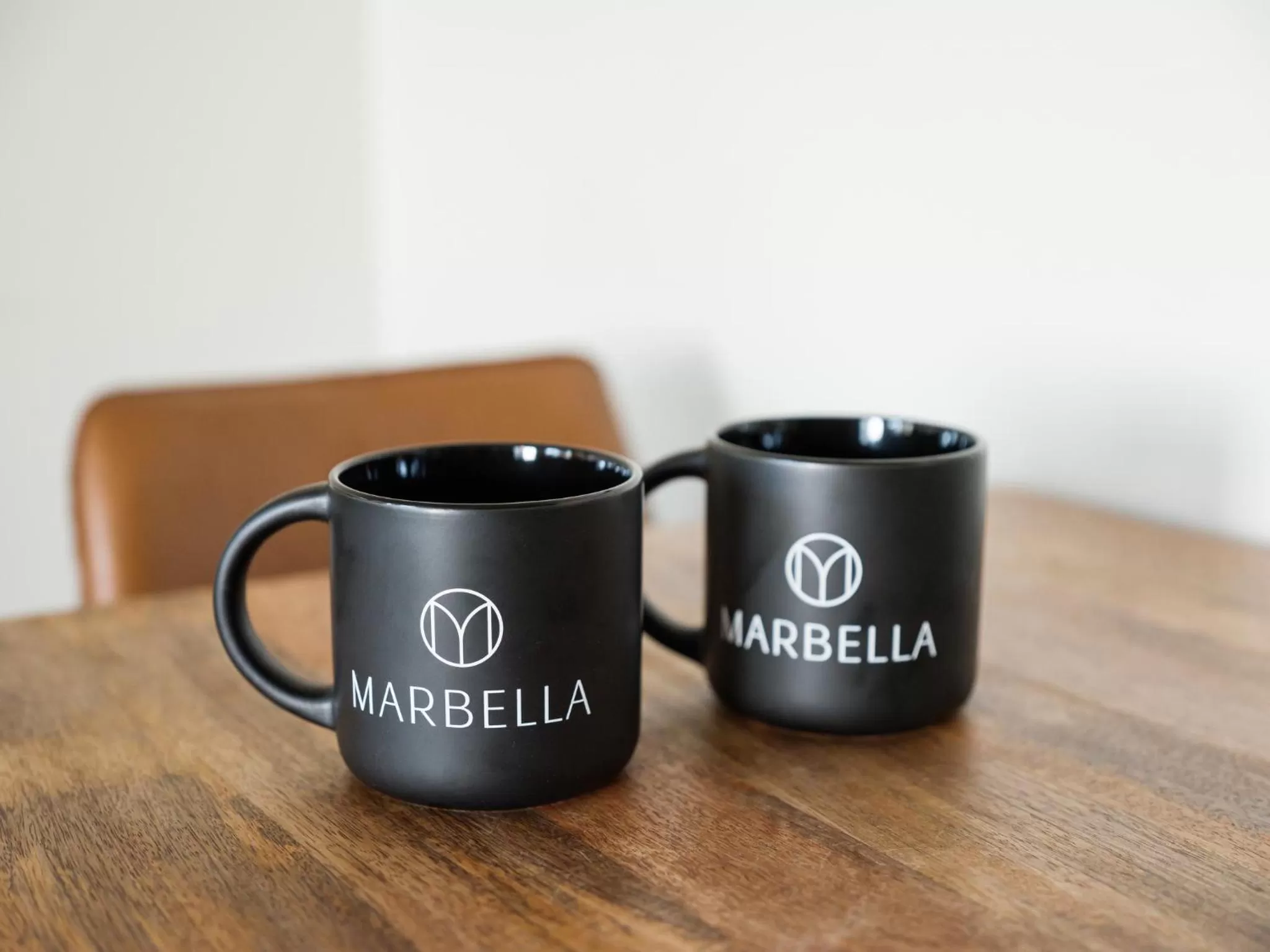 Property logo or sign in The Marbella