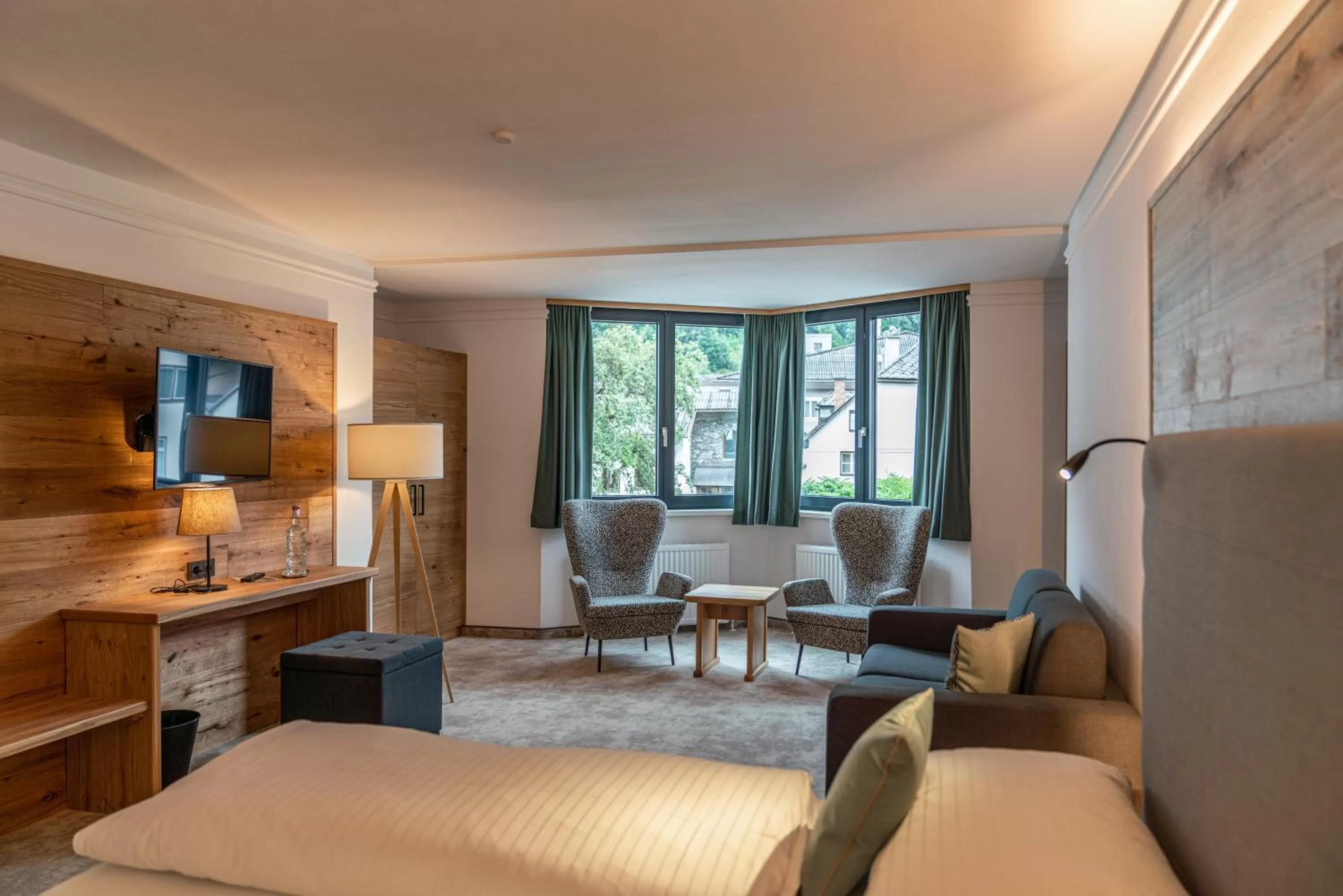 Seating area, Bed in Stadtvilla Schladming Boutiquehotel