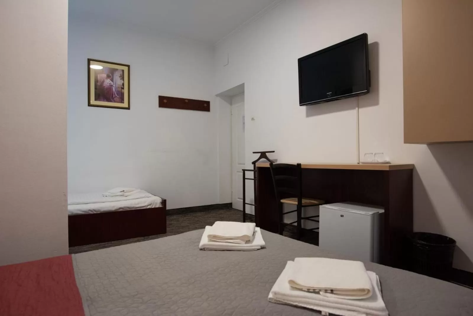 Bed in Carnival City Hotel Oradea