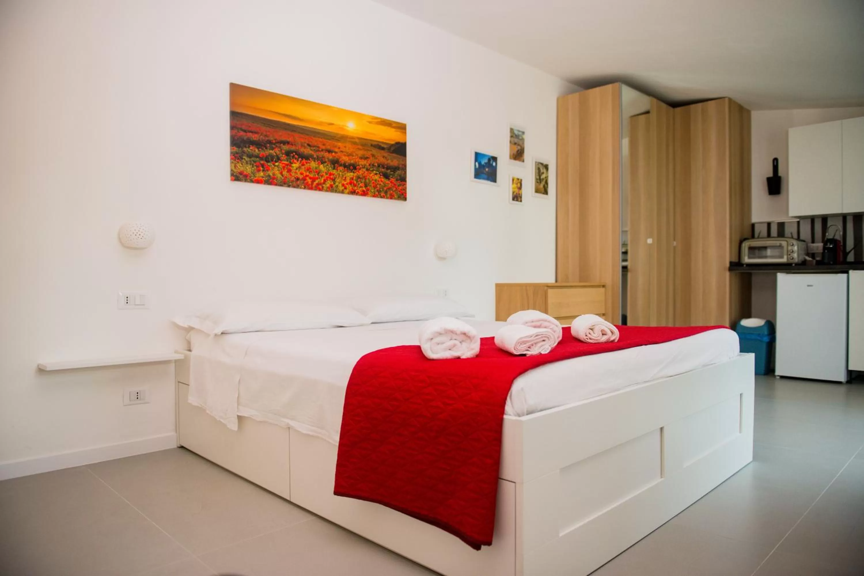 Photo of the whole room, Bed in Divina Perla