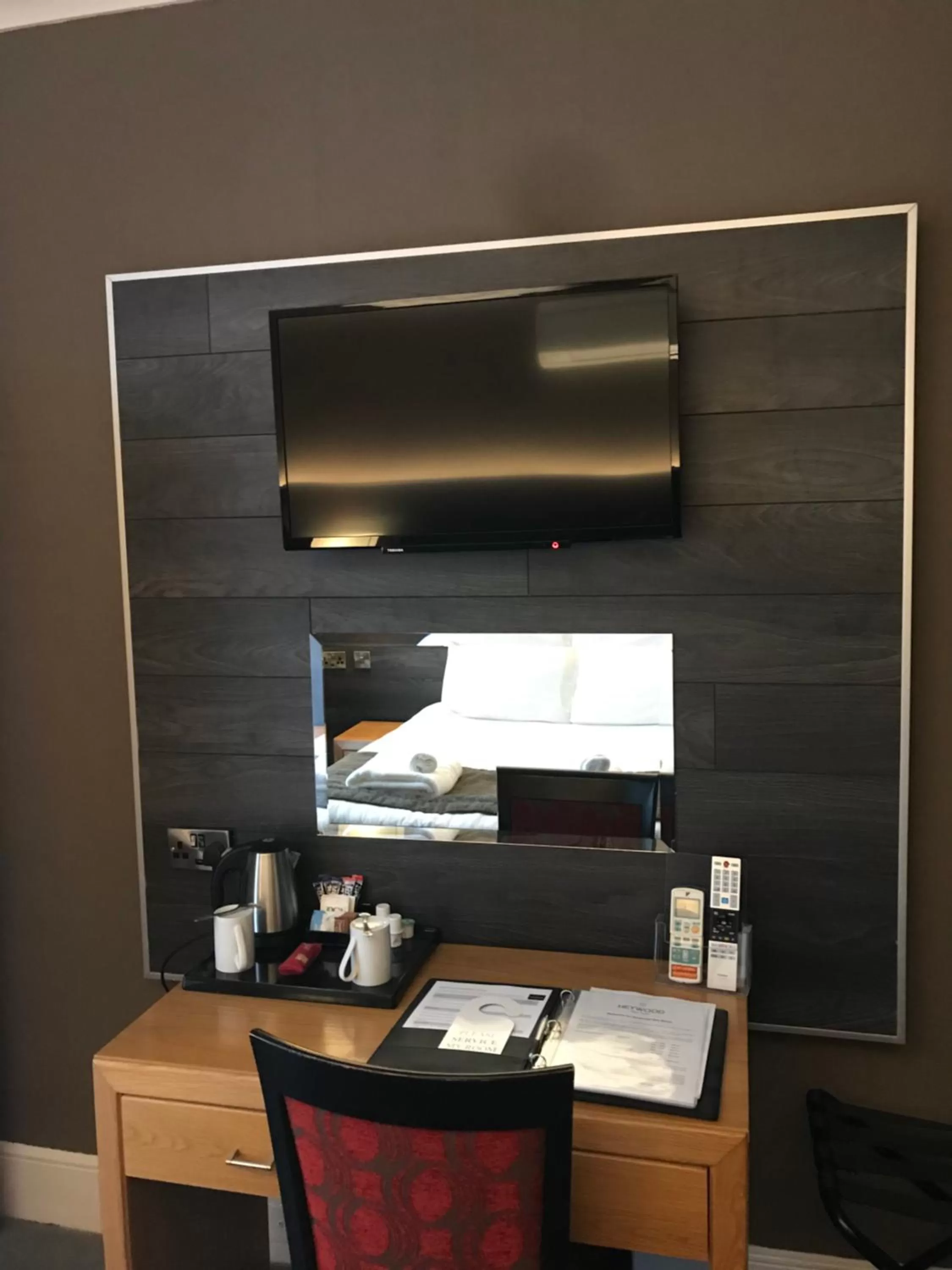 Communal lounge/ TV room, Bed in Heywood Spa Hotel