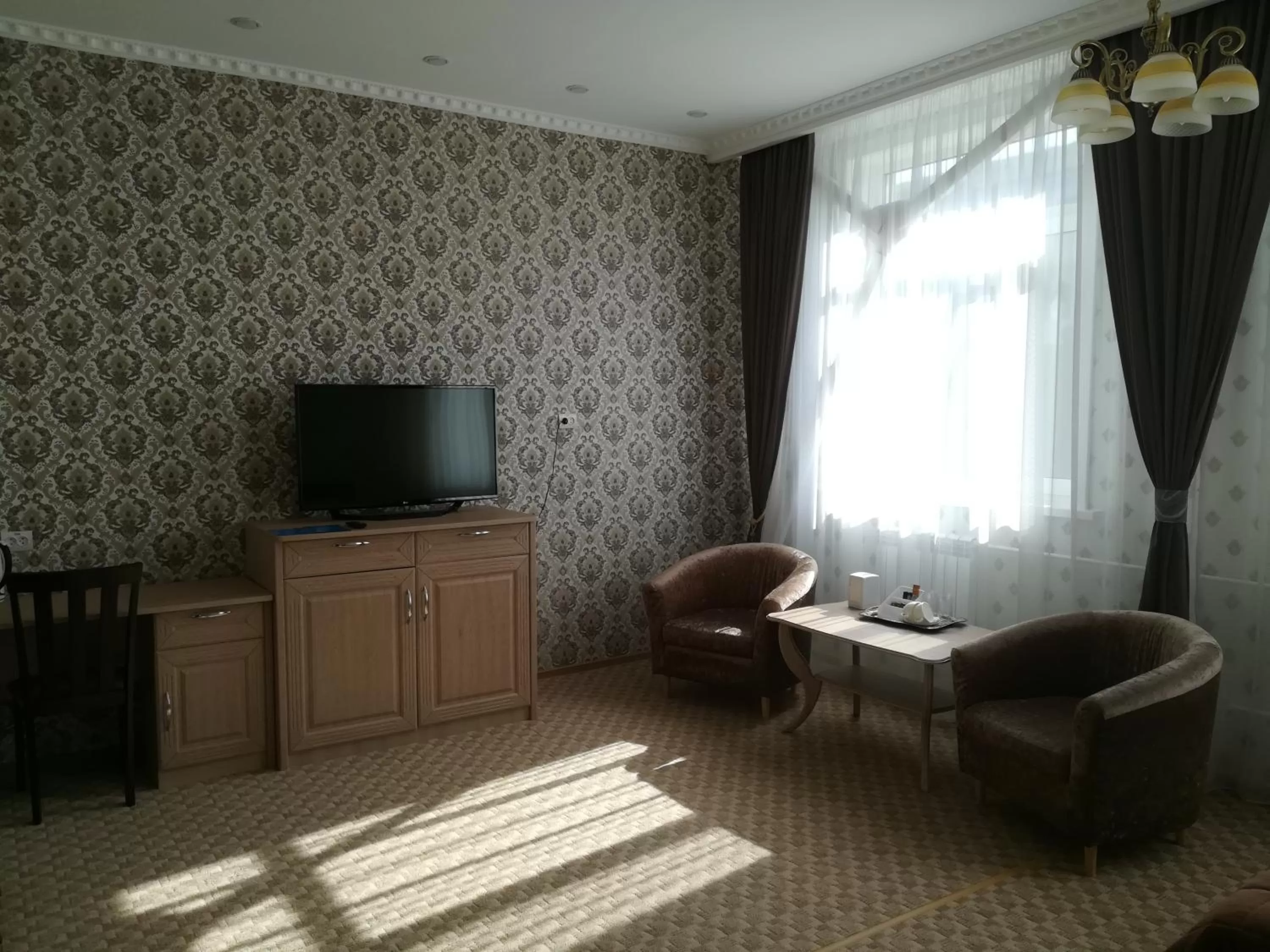 TV and multimedia, TV/Entertainment Center in Hotel Bahetle