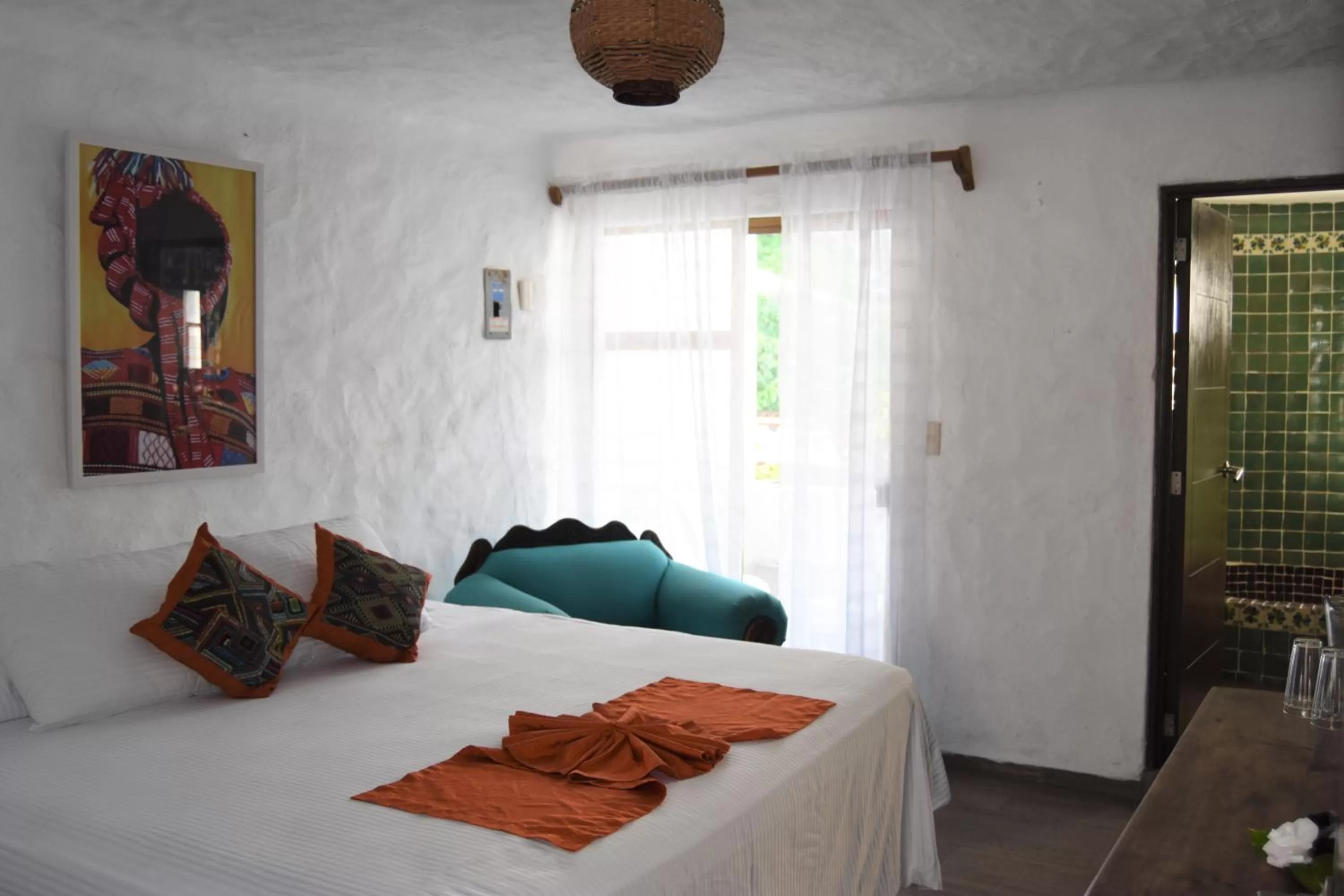 Bed in Petit Hotel Pilitas