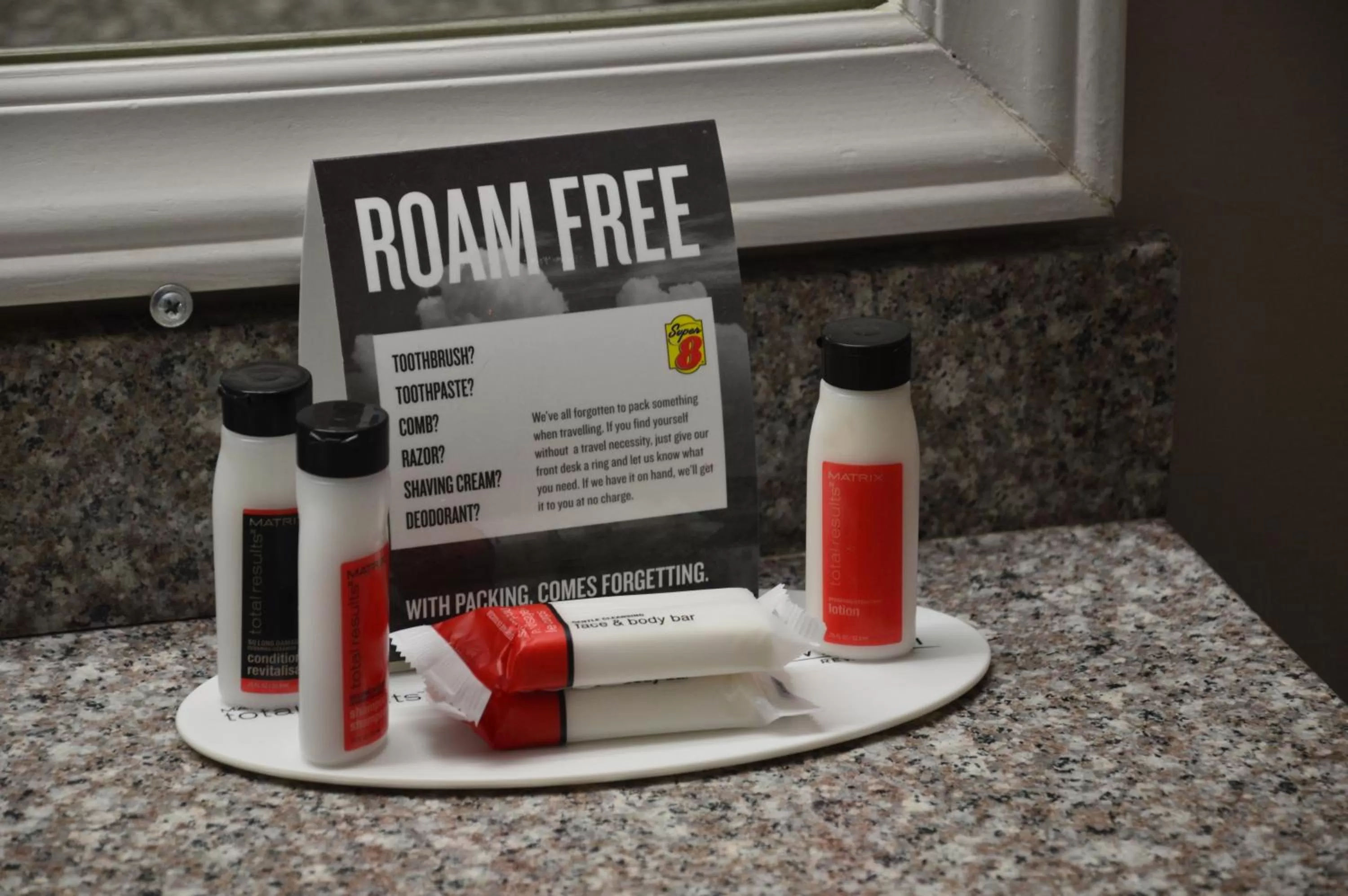 Property logo or sign in Super 8 by Wyndham Madison