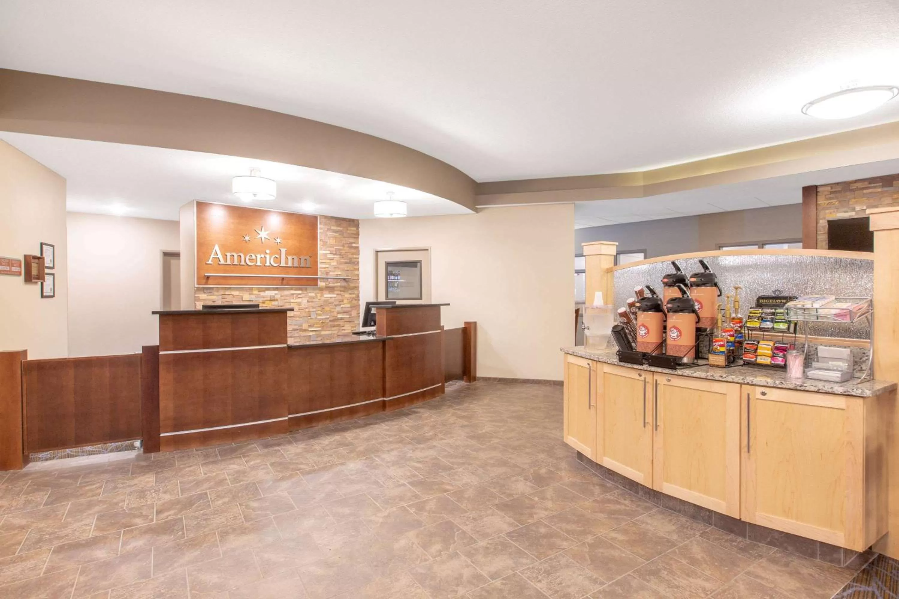 Lobby or reception in AmericInn by Wyndham Humboldt