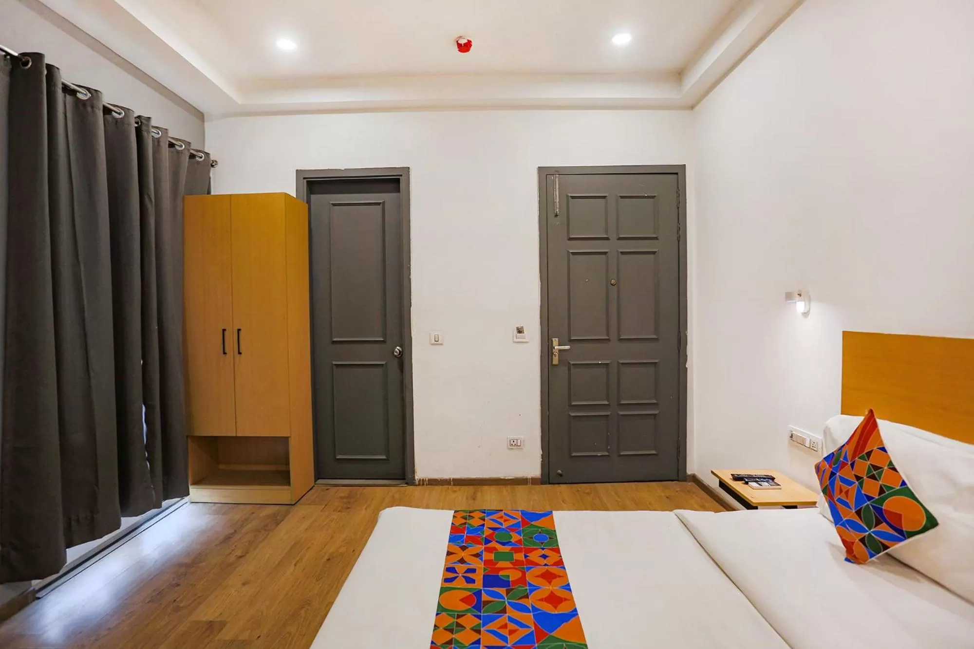 Photo of the whole room, Bed in FabHotel Roseman