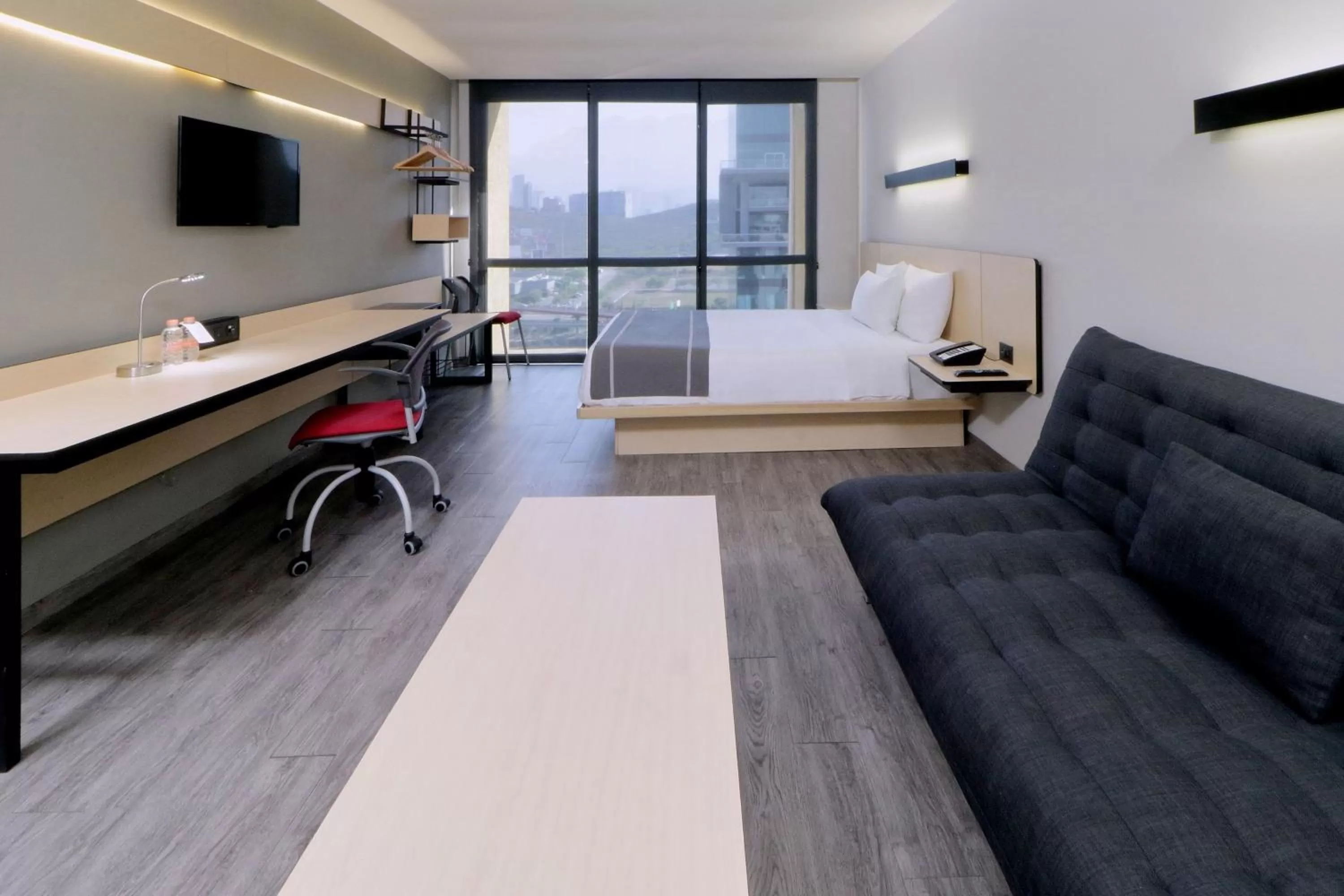 Photo of the whole room, Bed in City Express Plus by Marriott Monterrey Galerías