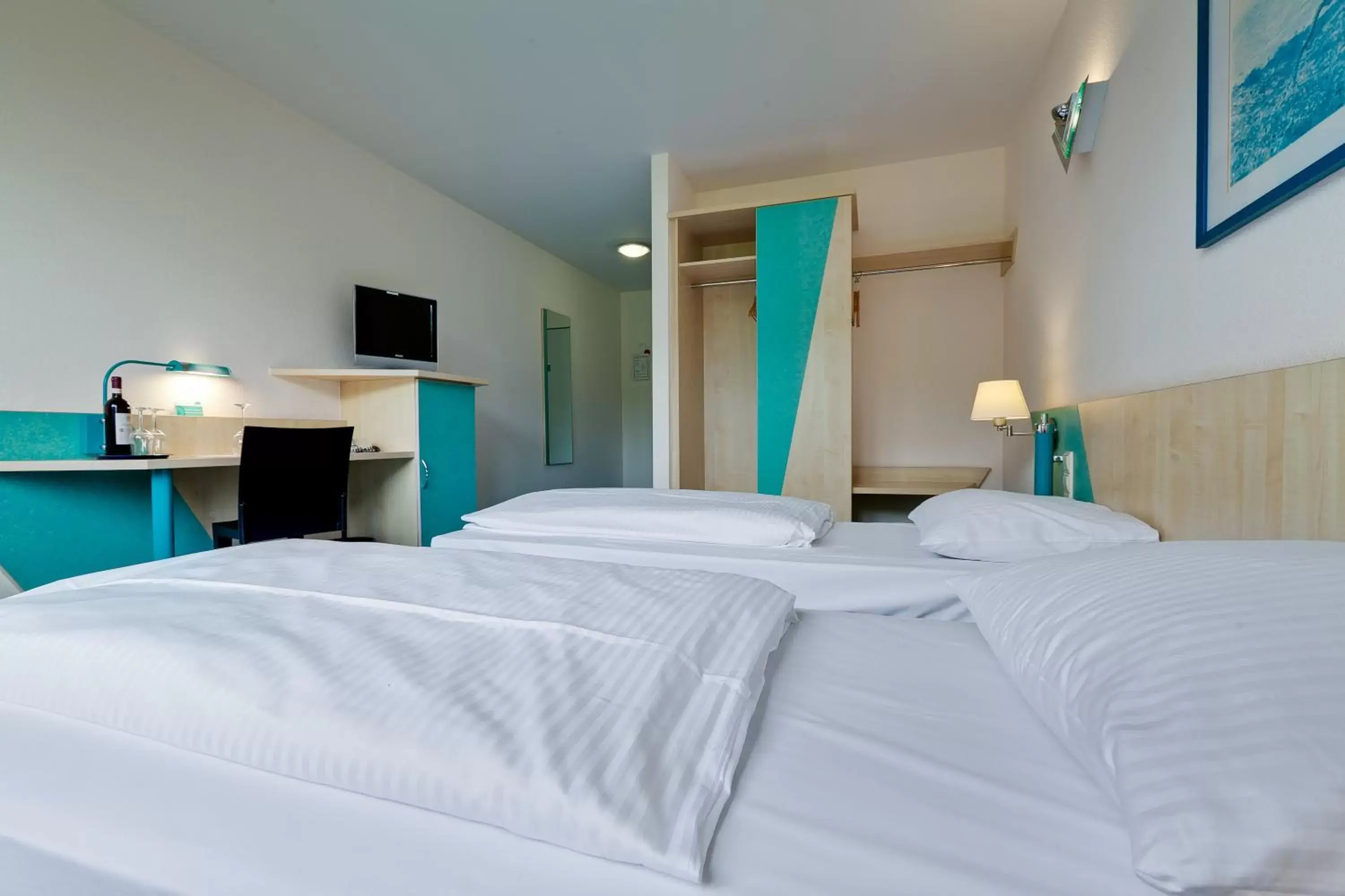 Quadruple Room in Hotel Le Village Quadruple Room in Hotel Le Village