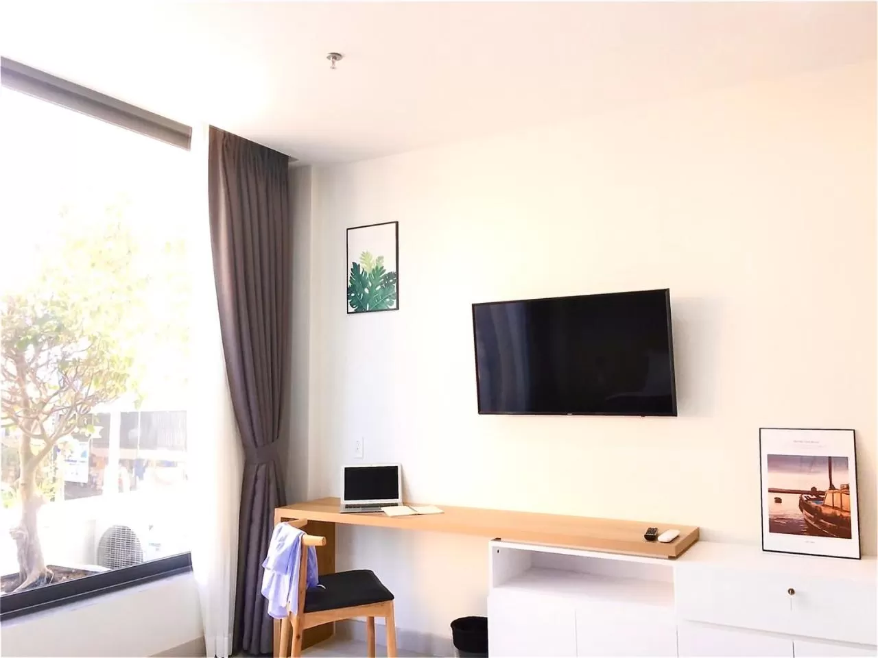 Living room, TV/Entertainment Center in The Green House - Serviced Apartment
