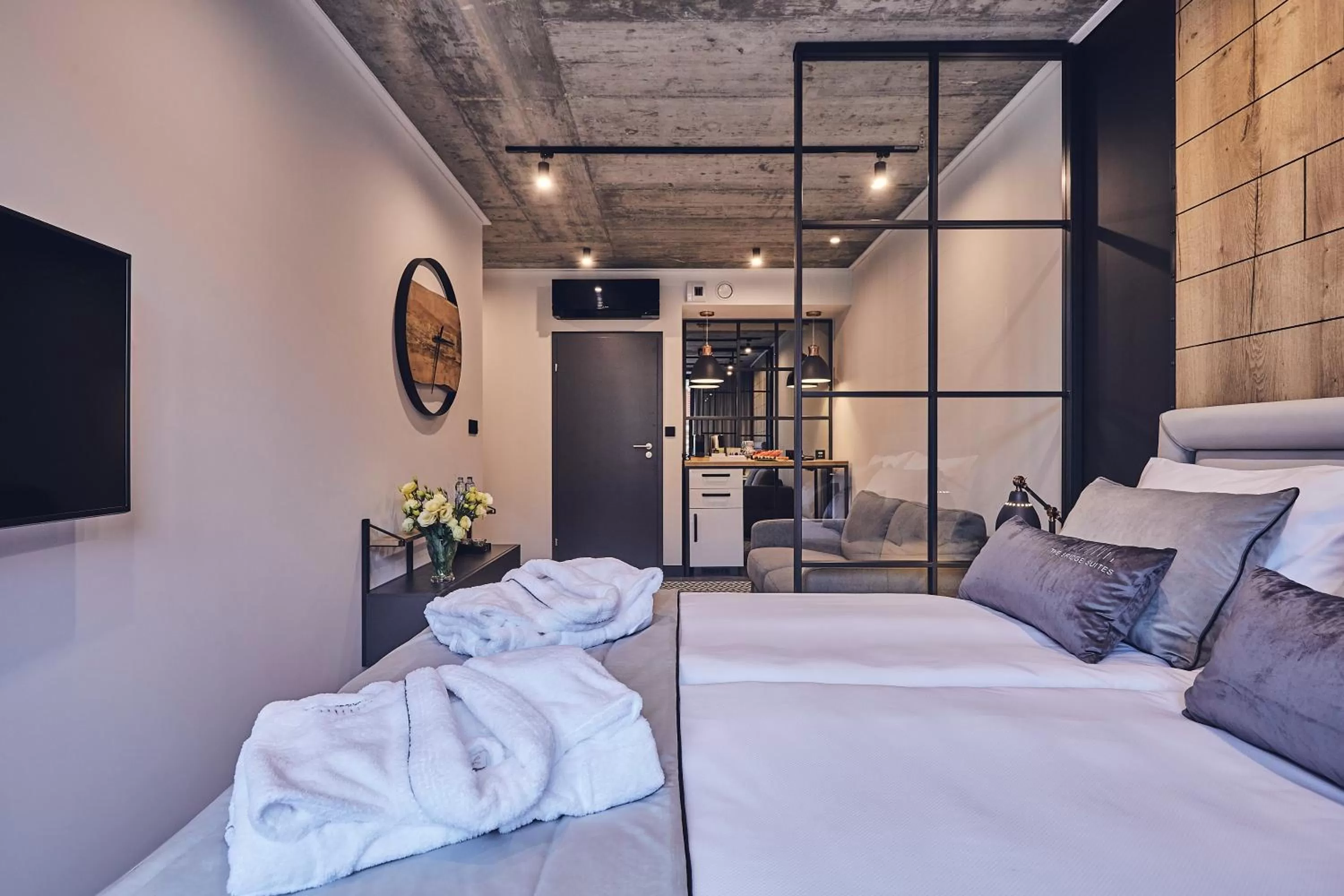 Photo of the whole room, Bed in The Bridge Suites Hotel