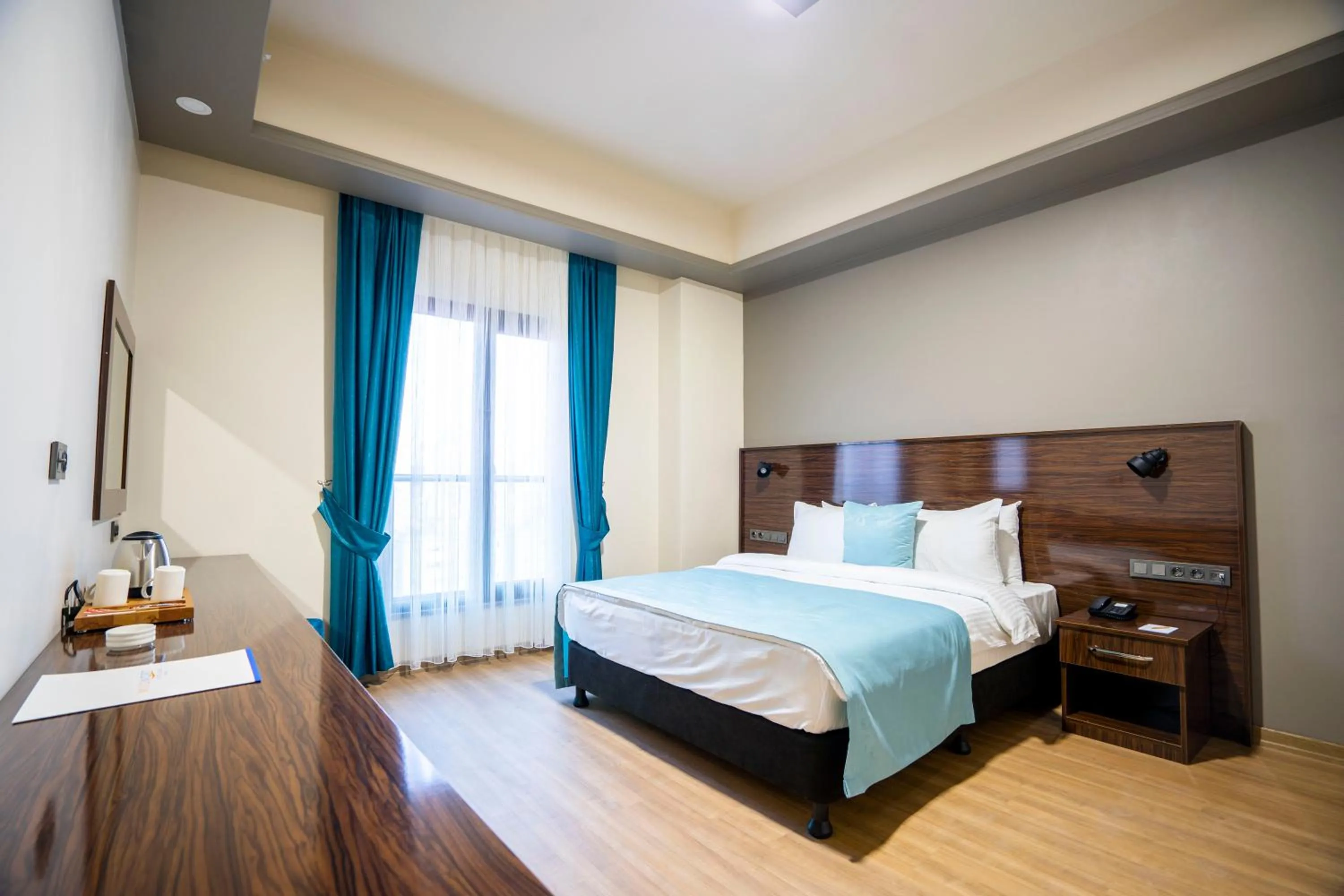 Bed in Mugwort Hotel & Spa