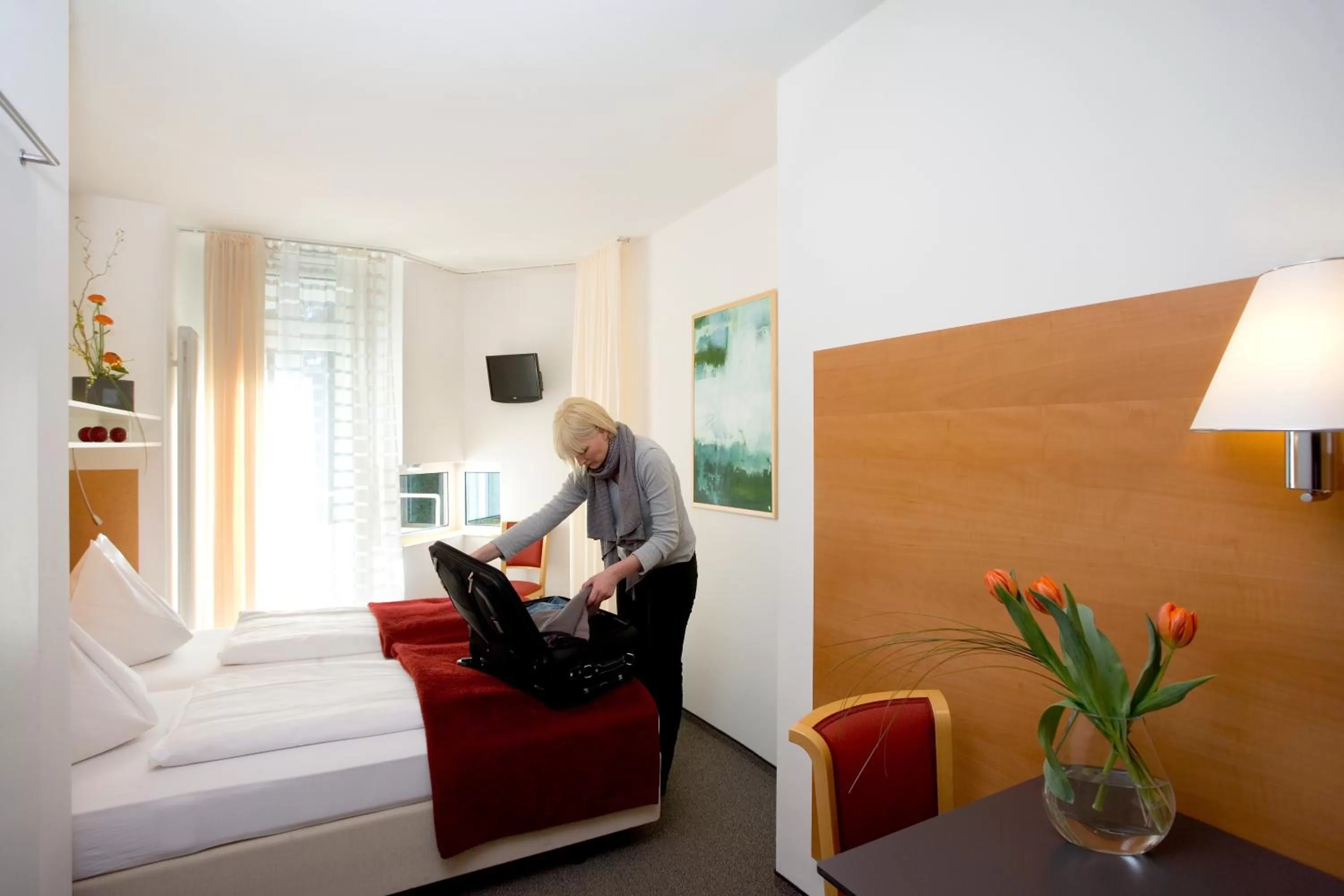 Photo of the whole room, Bed in Hotel St. Virgil Salzburg