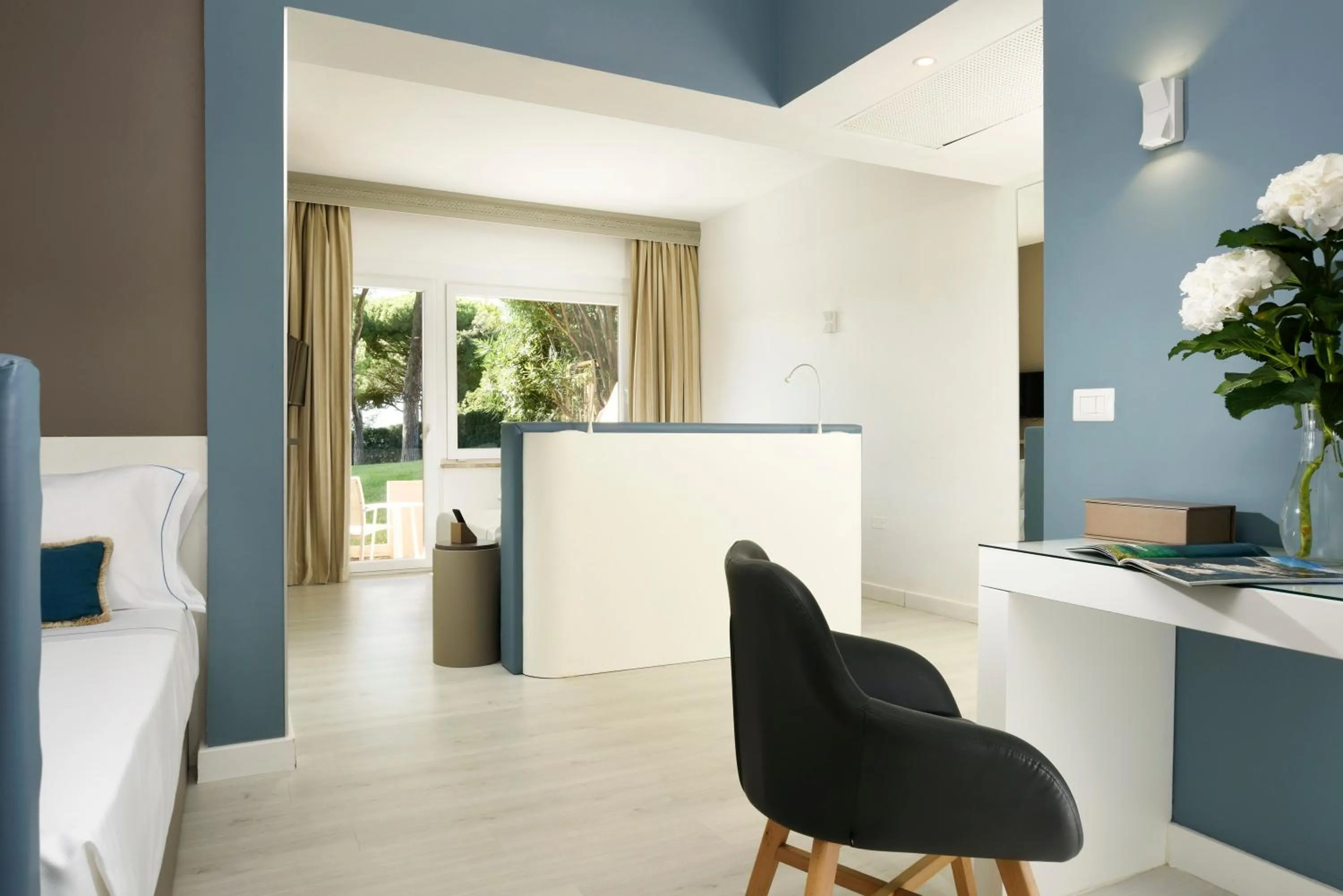 Bed in Golf Hotel Punta Ala