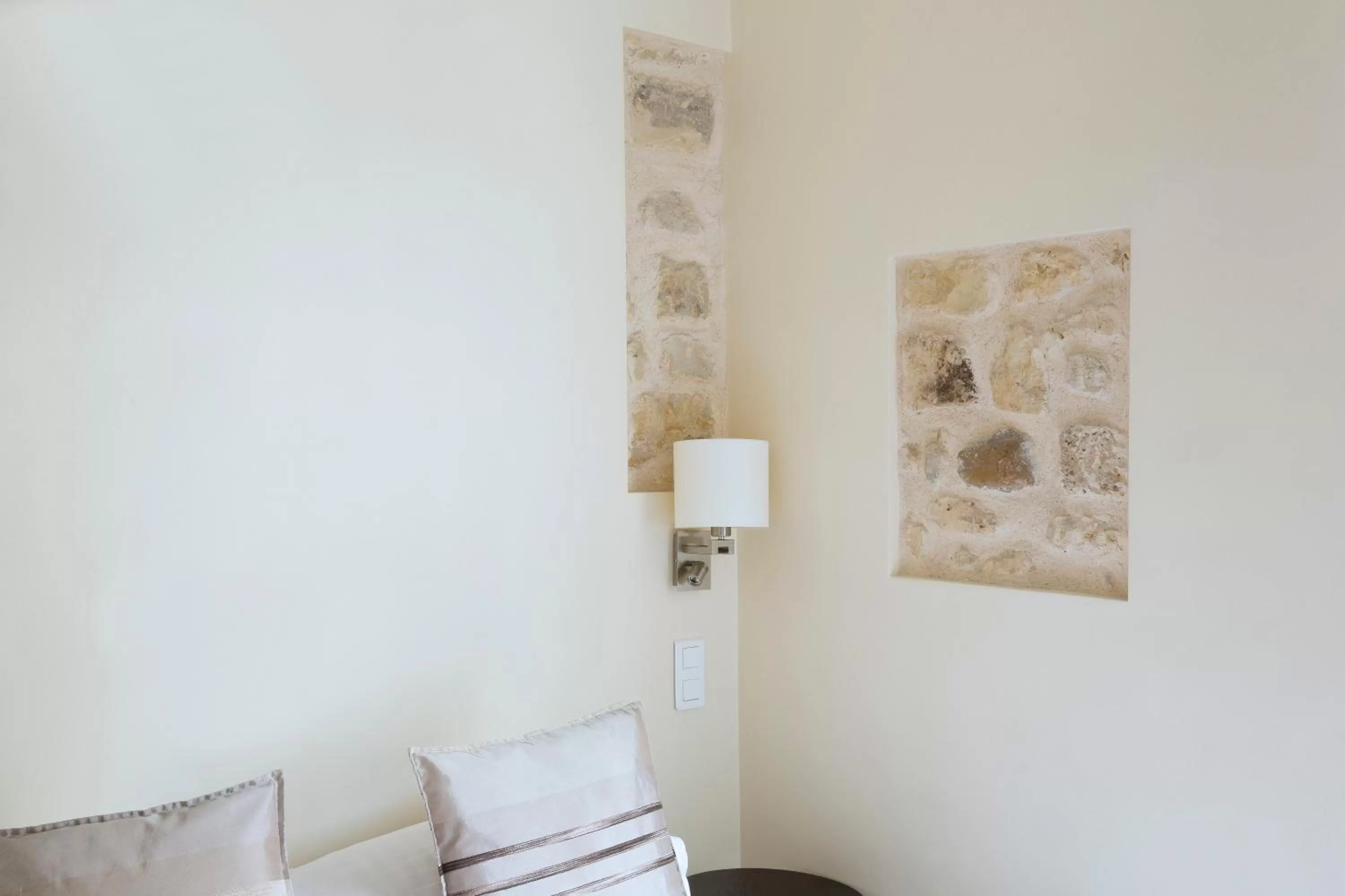 Bedroom in Lion d'Or Paris Hotel