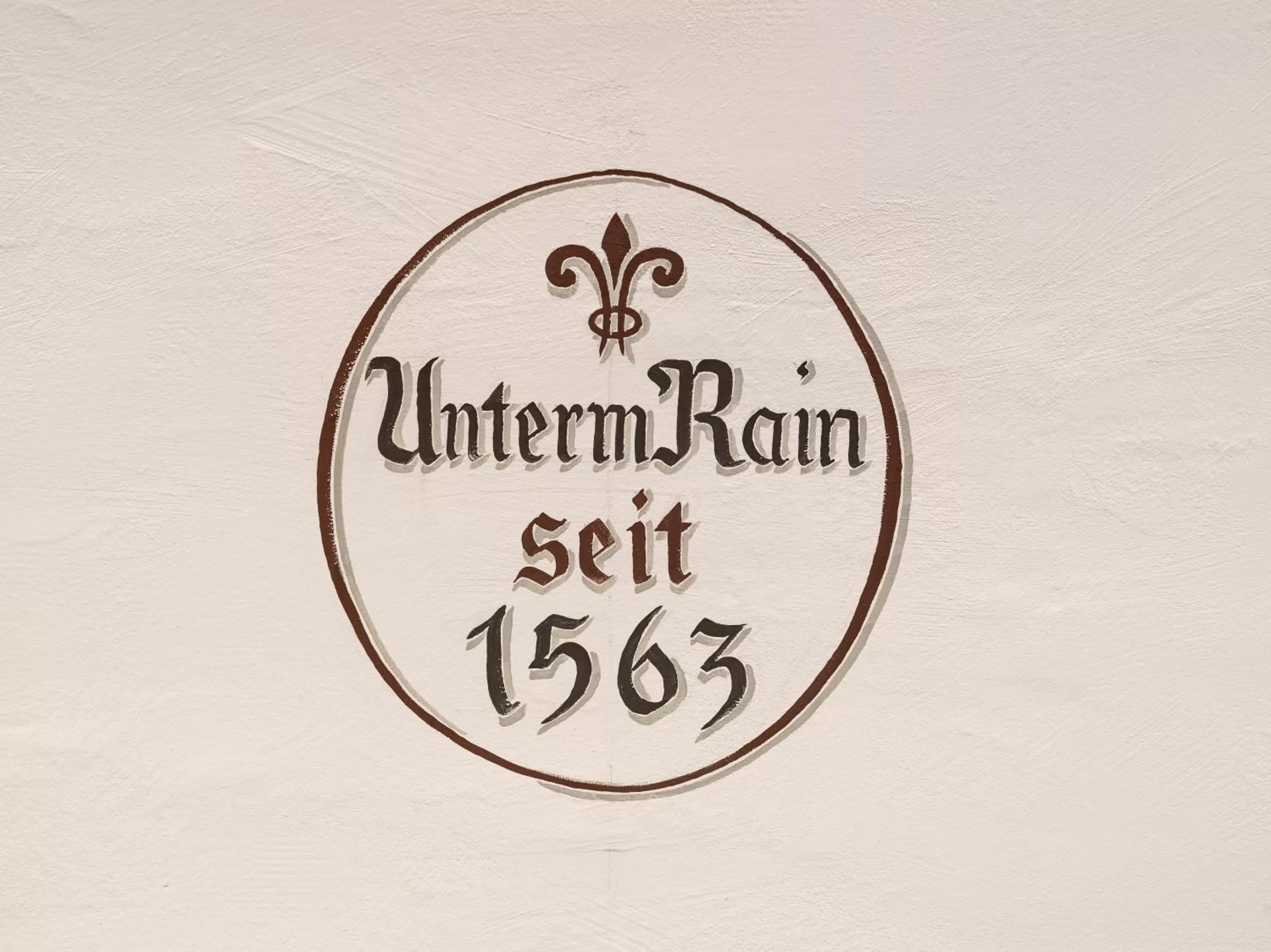 Property logo or sign in Alpen Glück Hotel Unterm Rain garni