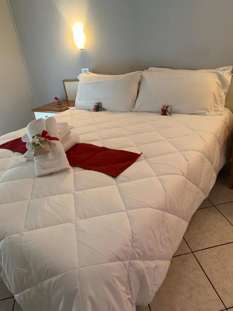 Bed in Hotel Oasi del Mare