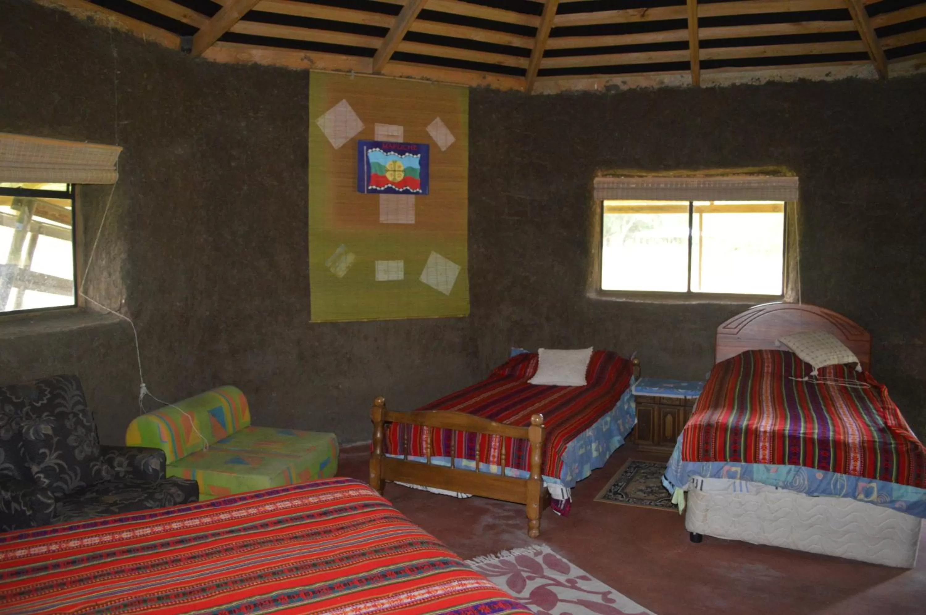 Bed in Coyunche Cabañas y Camping Laja & San Rosendo