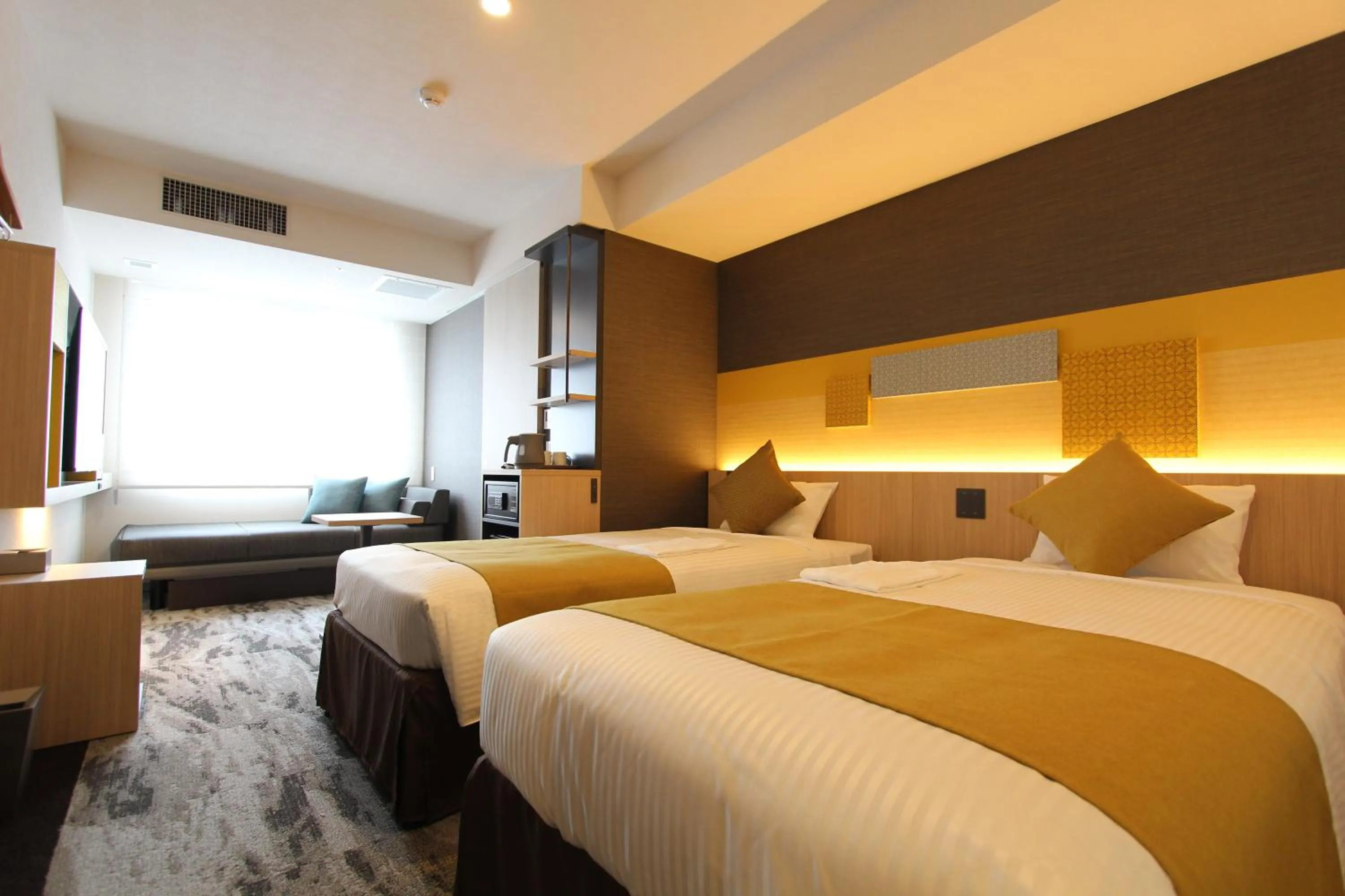 Bed in KOKO HOTEL Tsukiji Ginza