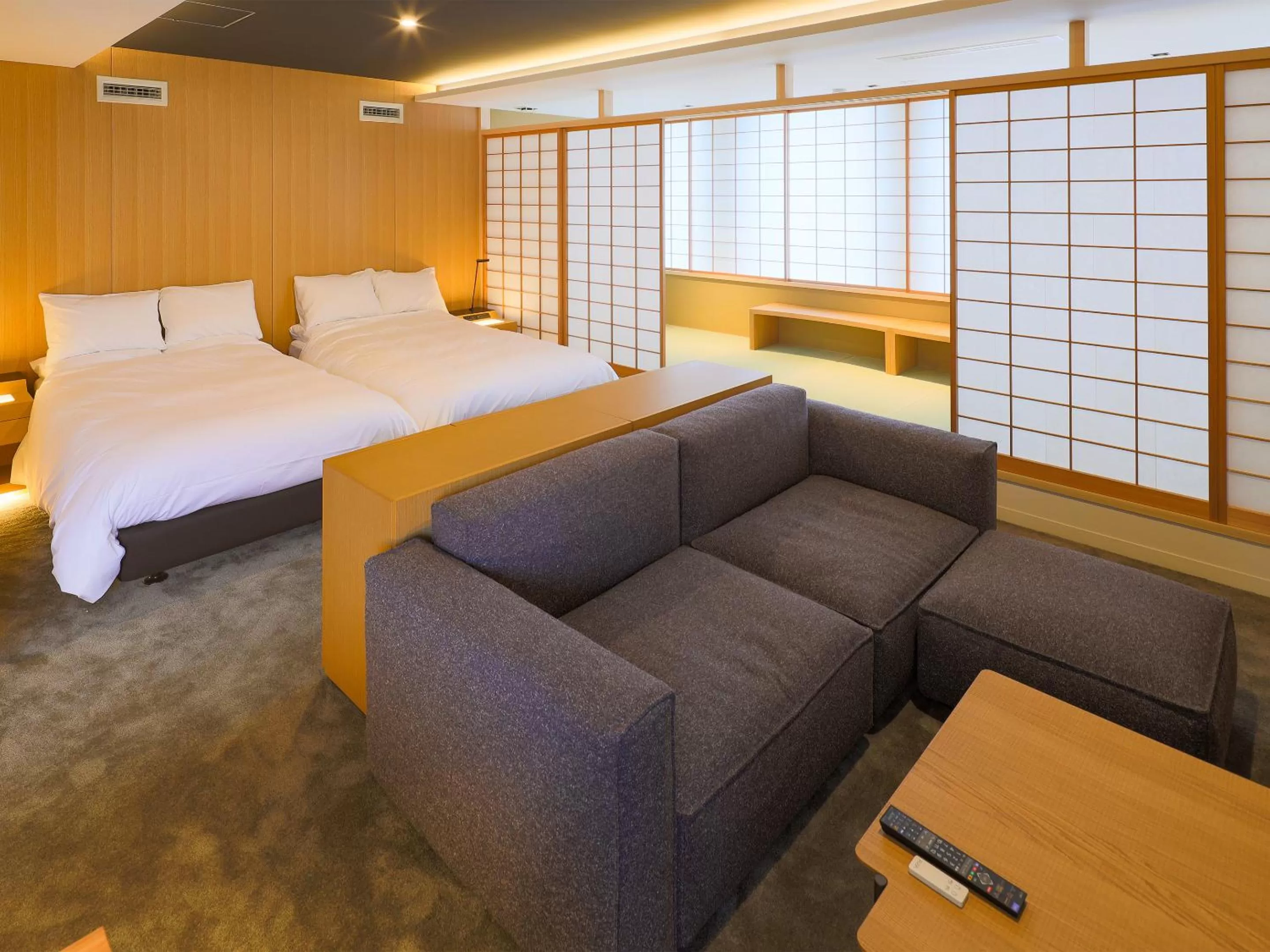 Living room, Bed in Hotel Muso