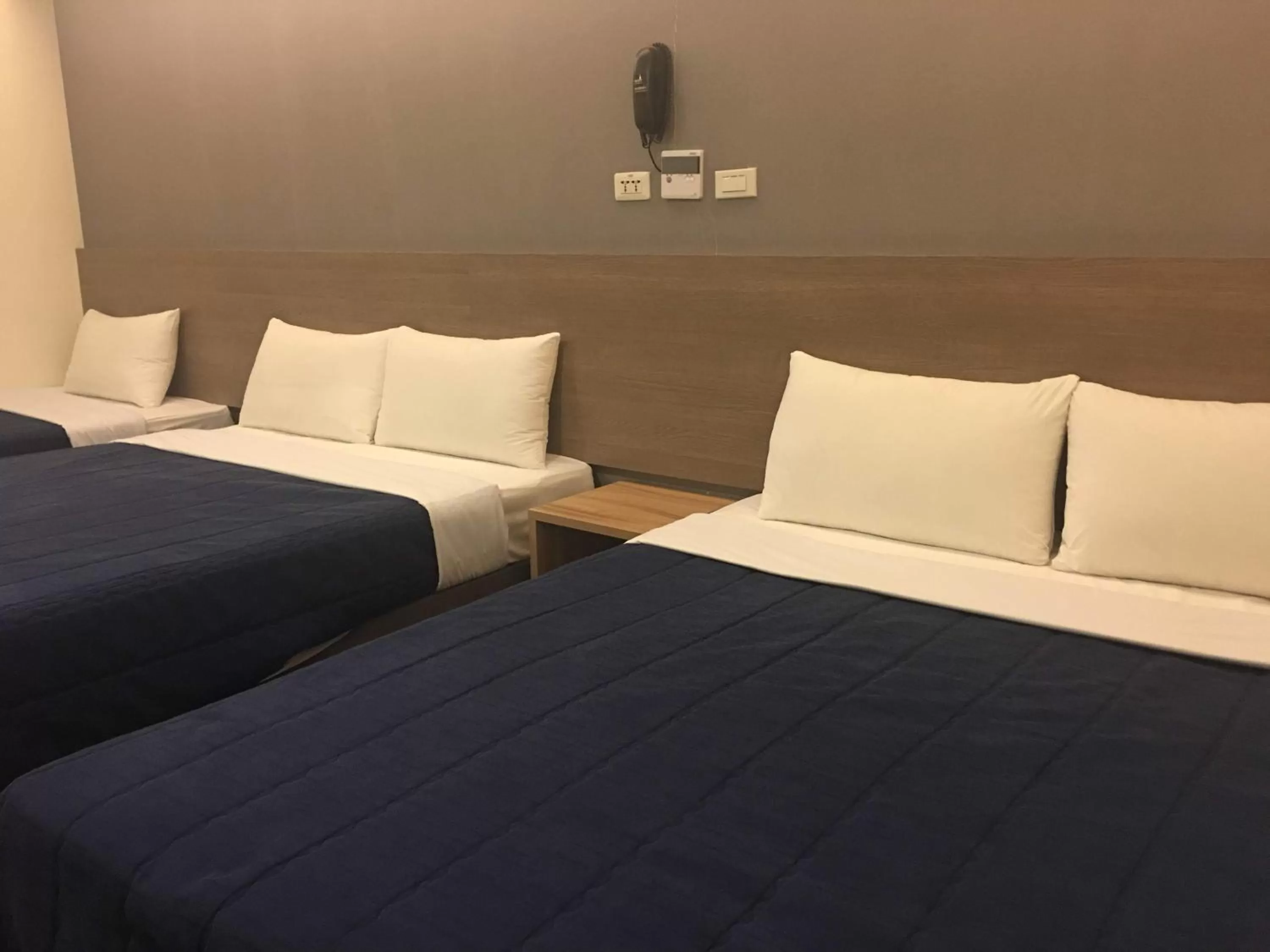 Bed in Bulowan Hotel