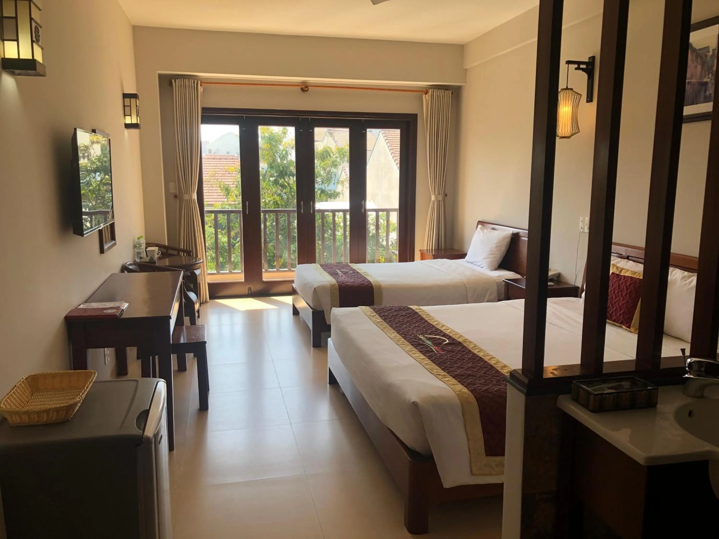 Bed in Sunshine Hoian Hotel