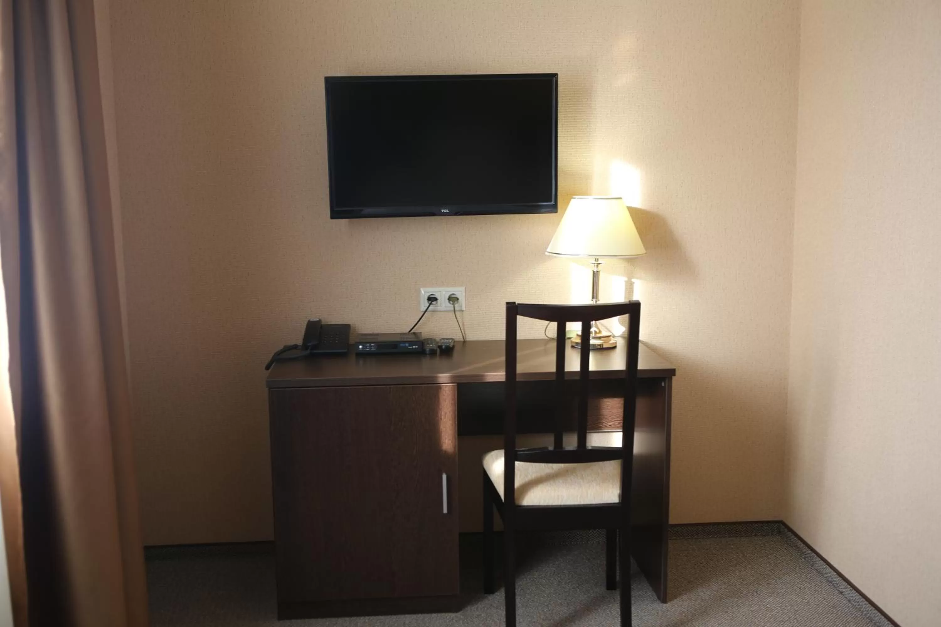 TV and multimedia, TV/Entertainment Center in Hotel Aner