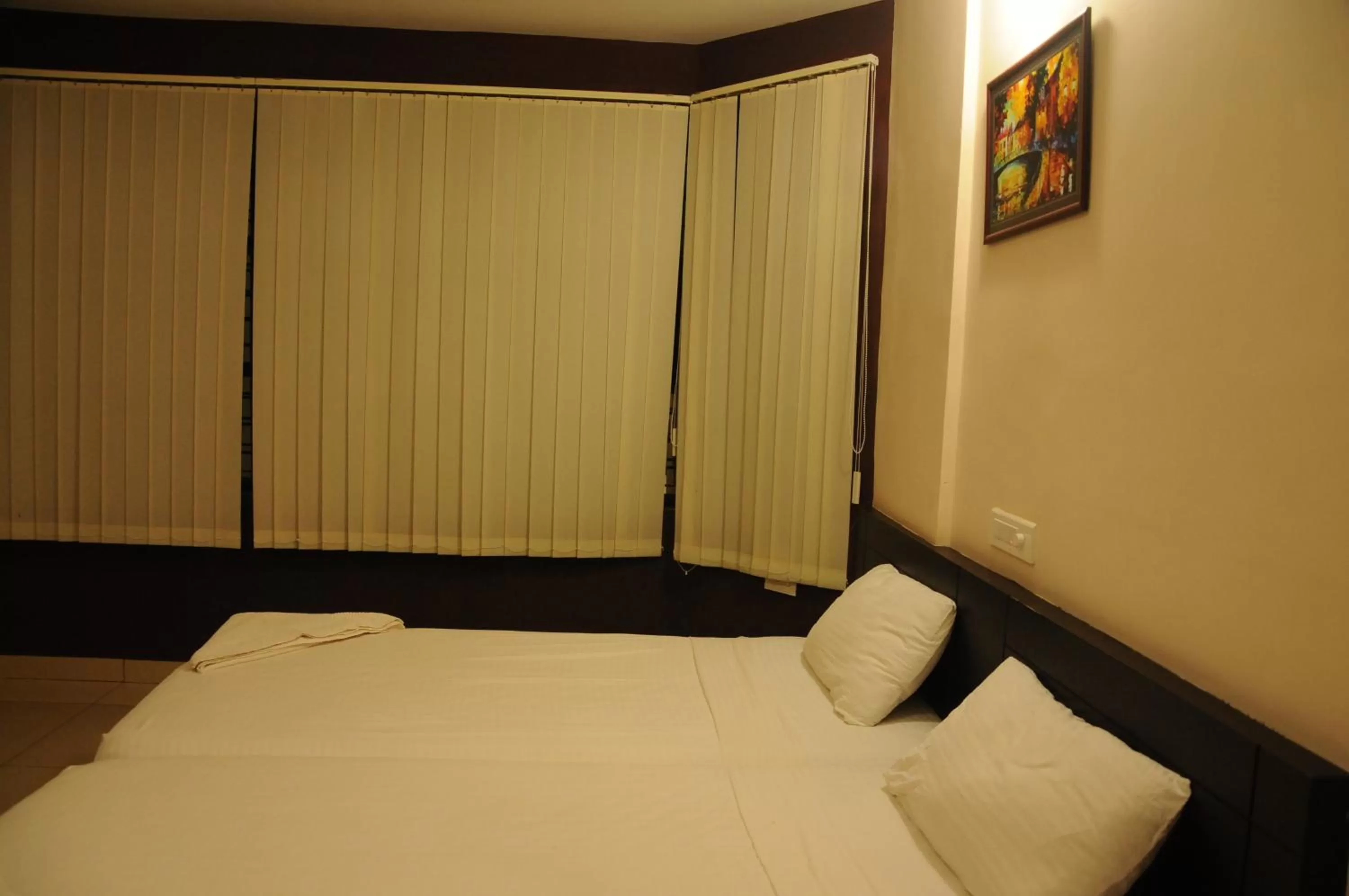 Bed in Hotel Sri Krishna Residency