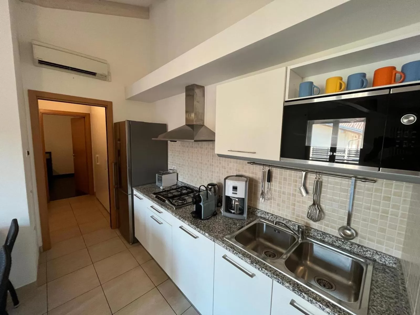Kitchen or kitchenette in 4 Limoni Apartment Resort