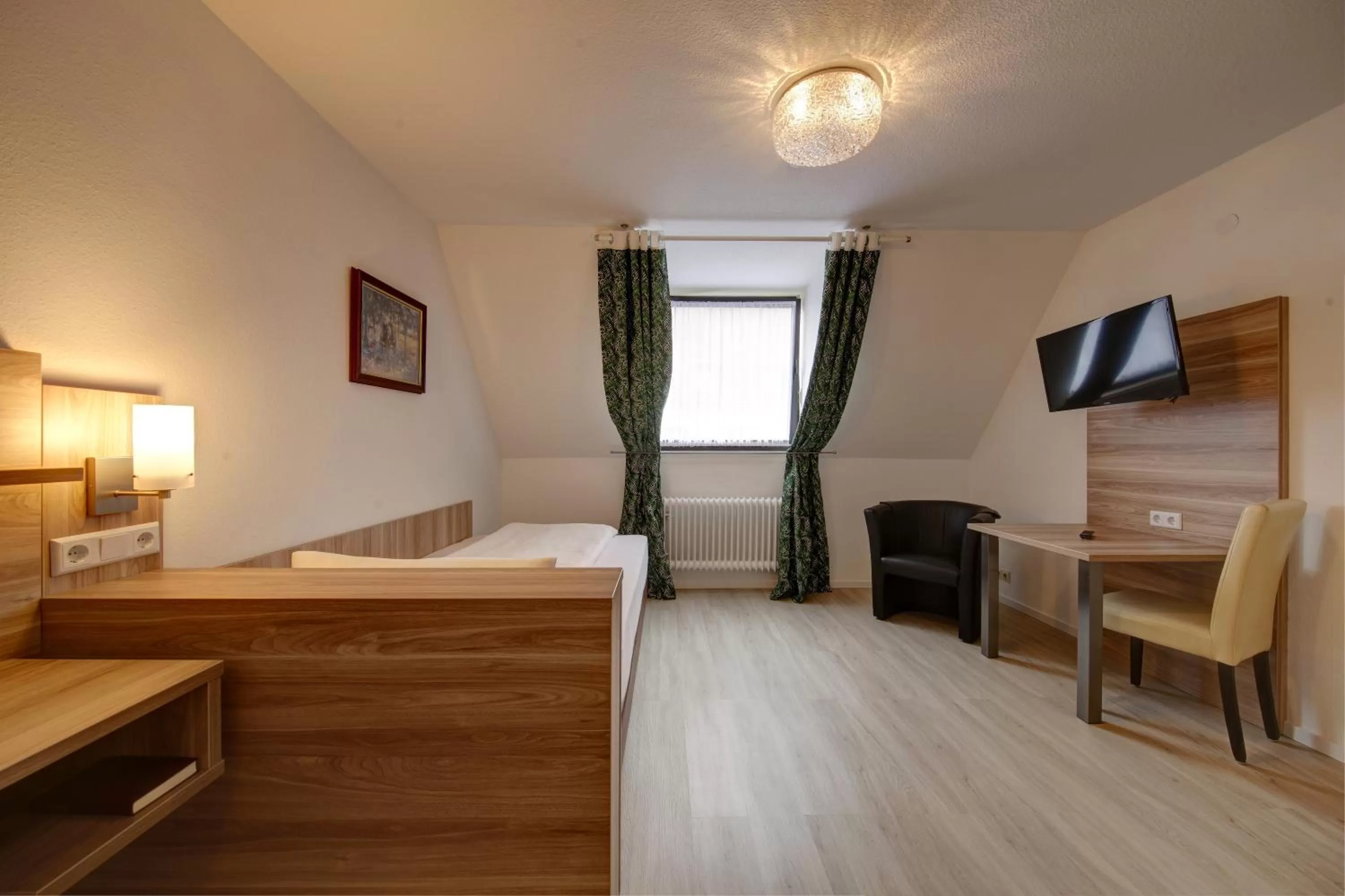 Bed in Aparthotel Deutschmeister