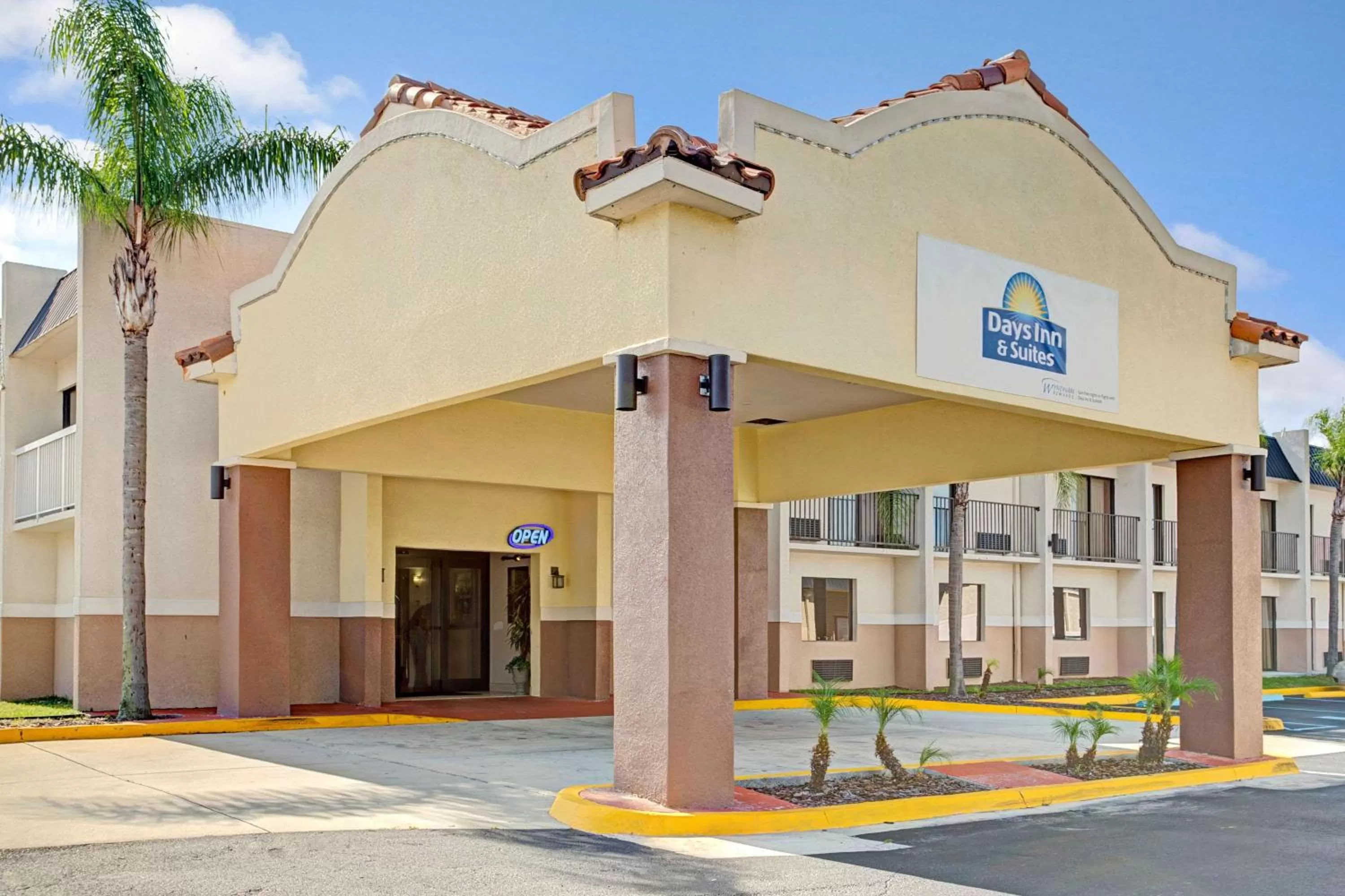 Property building in Days Inn & Suites by Wyndham Tampa - Ybor City