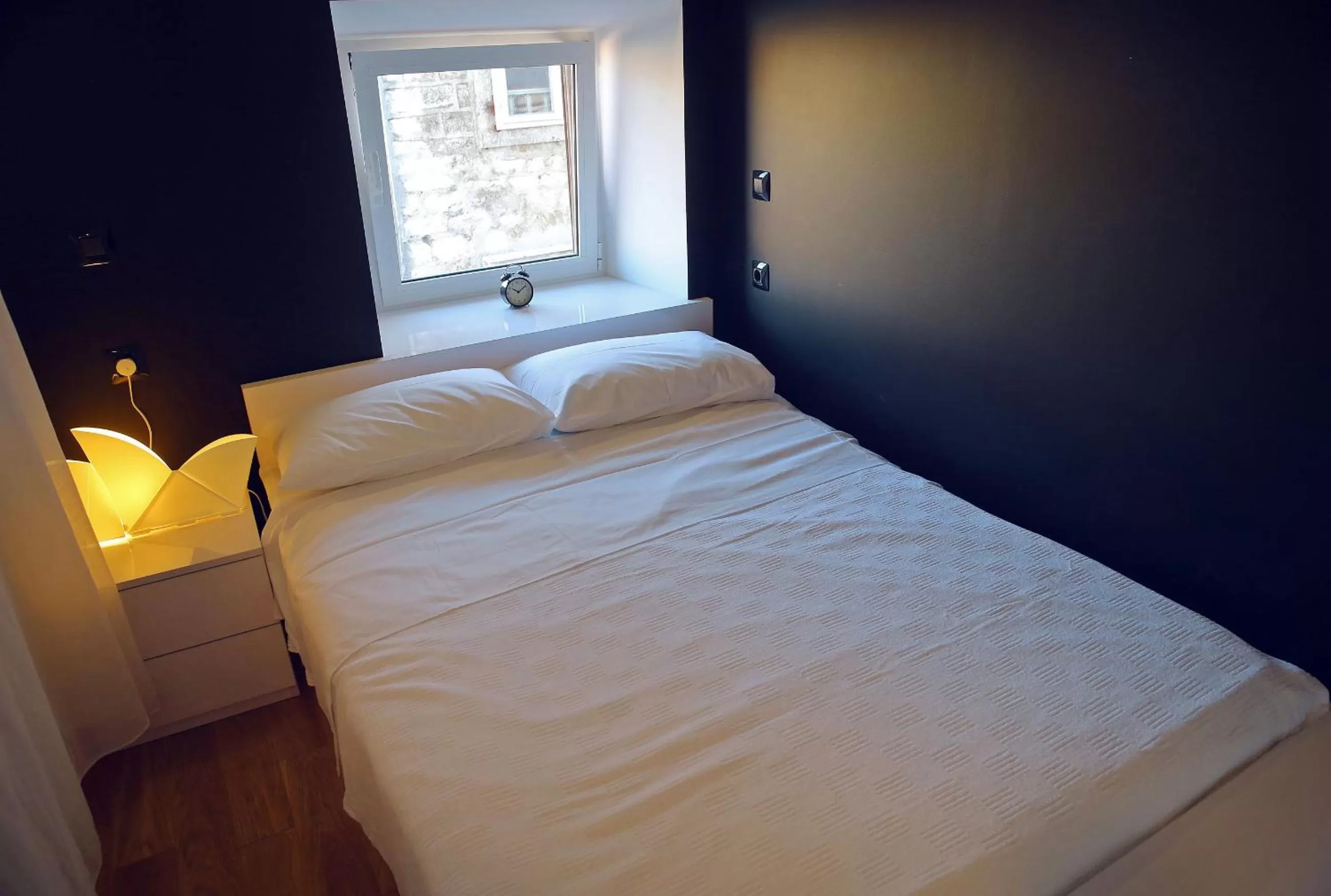 Bed in Central Apartments Integrated Hotel