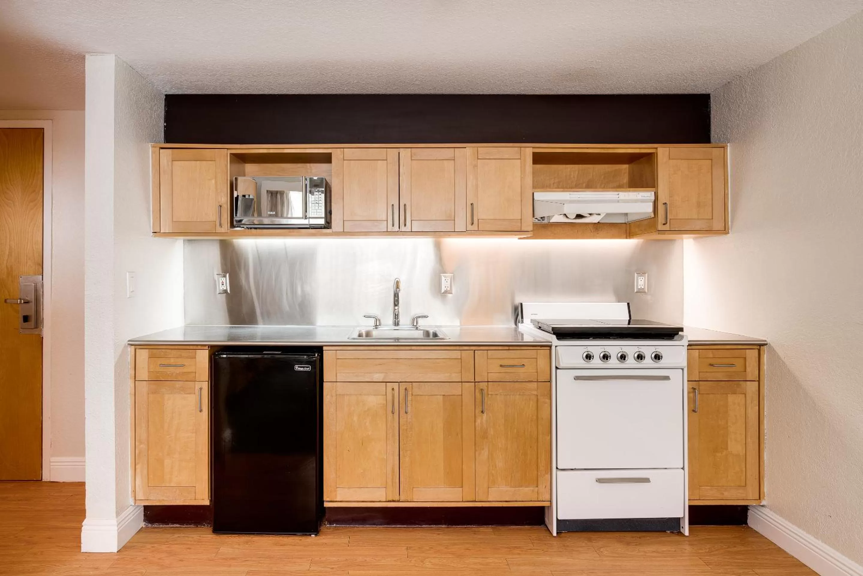 Kitchen or kitchenette in Crest Hotel Suites