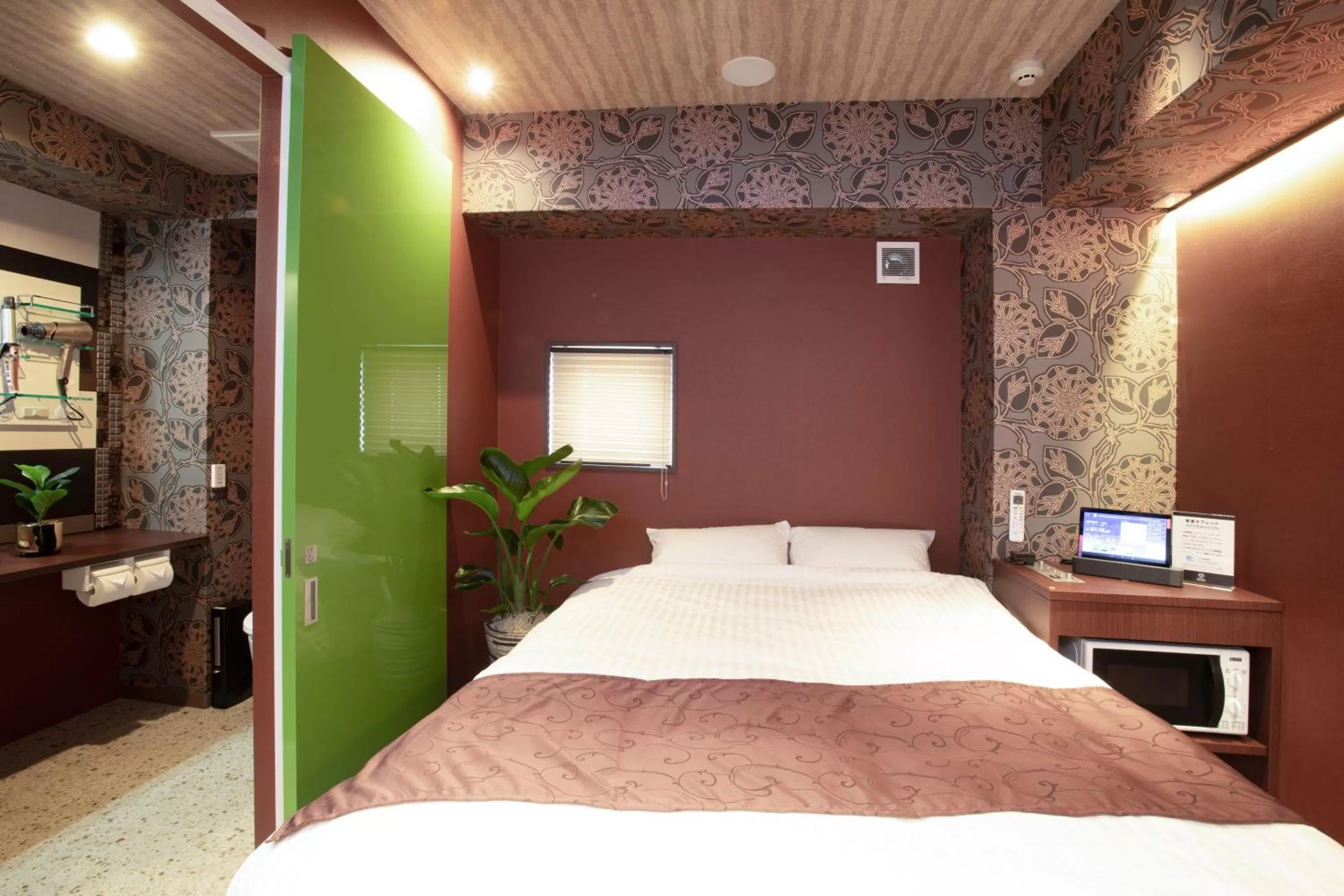 Bed in Pinpon Hotel Hiroshima