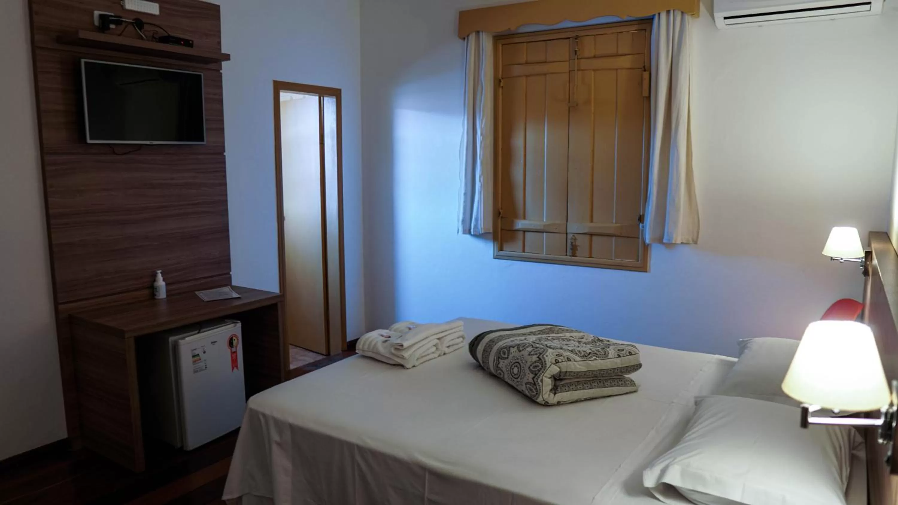 Bed in Pousada o Amanhecer