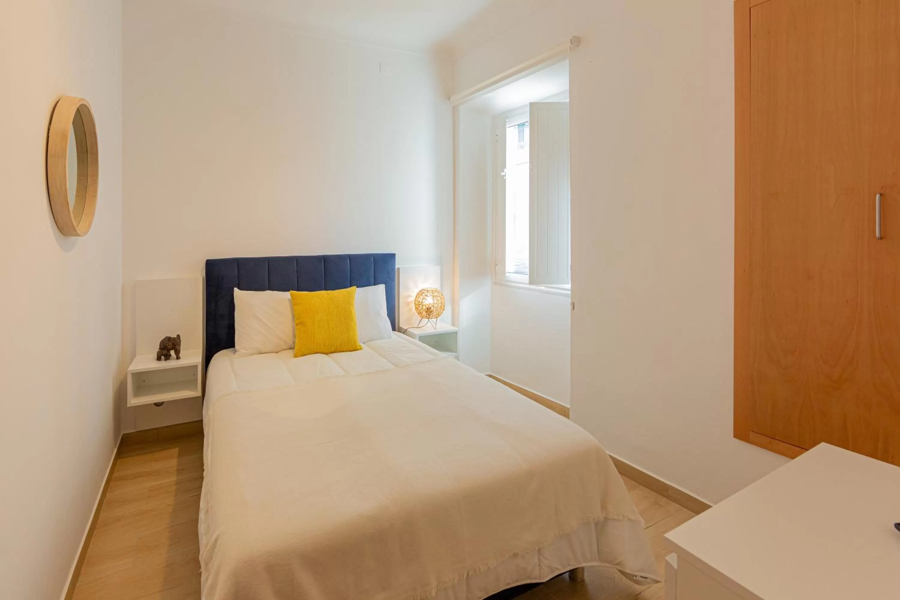 Bed in Luxury Palm Suites