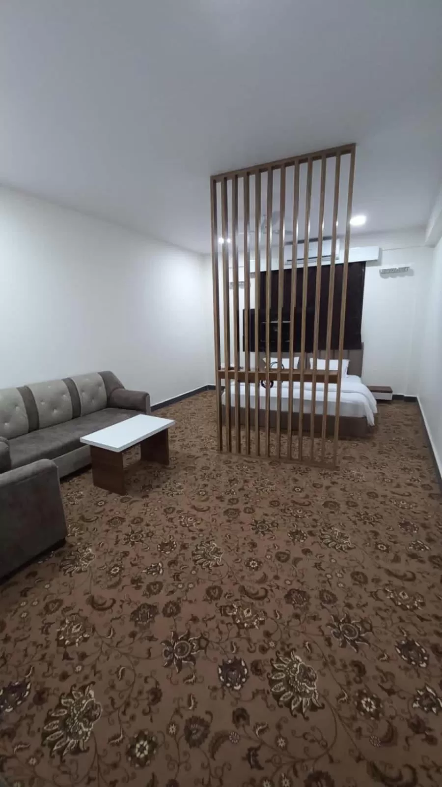 Seating area, Bed in Hotel Jurkis, Kolhapur