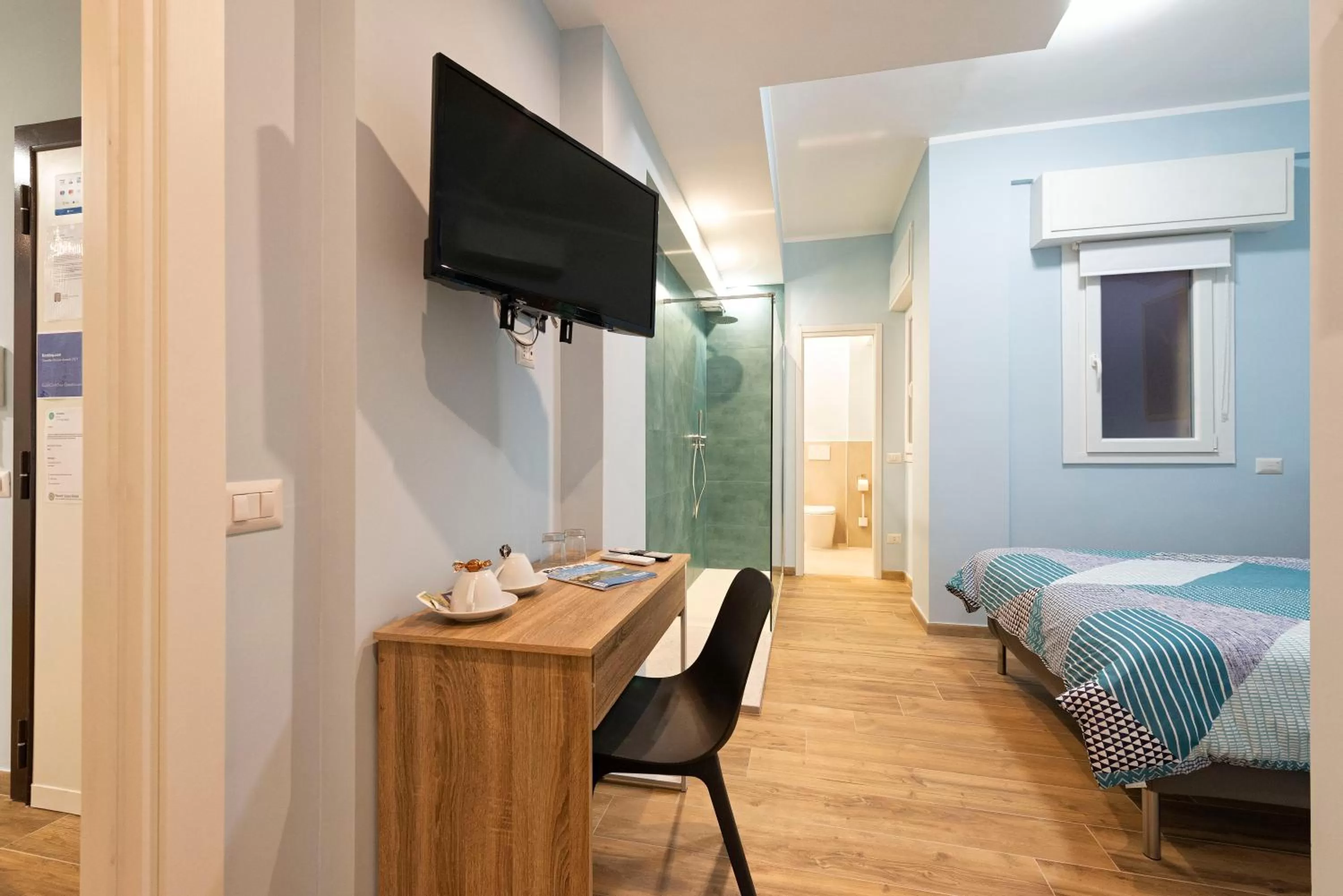 Bedroom, TV/Entertainment Center in RomeCookSea Guesthouse Affittacamere