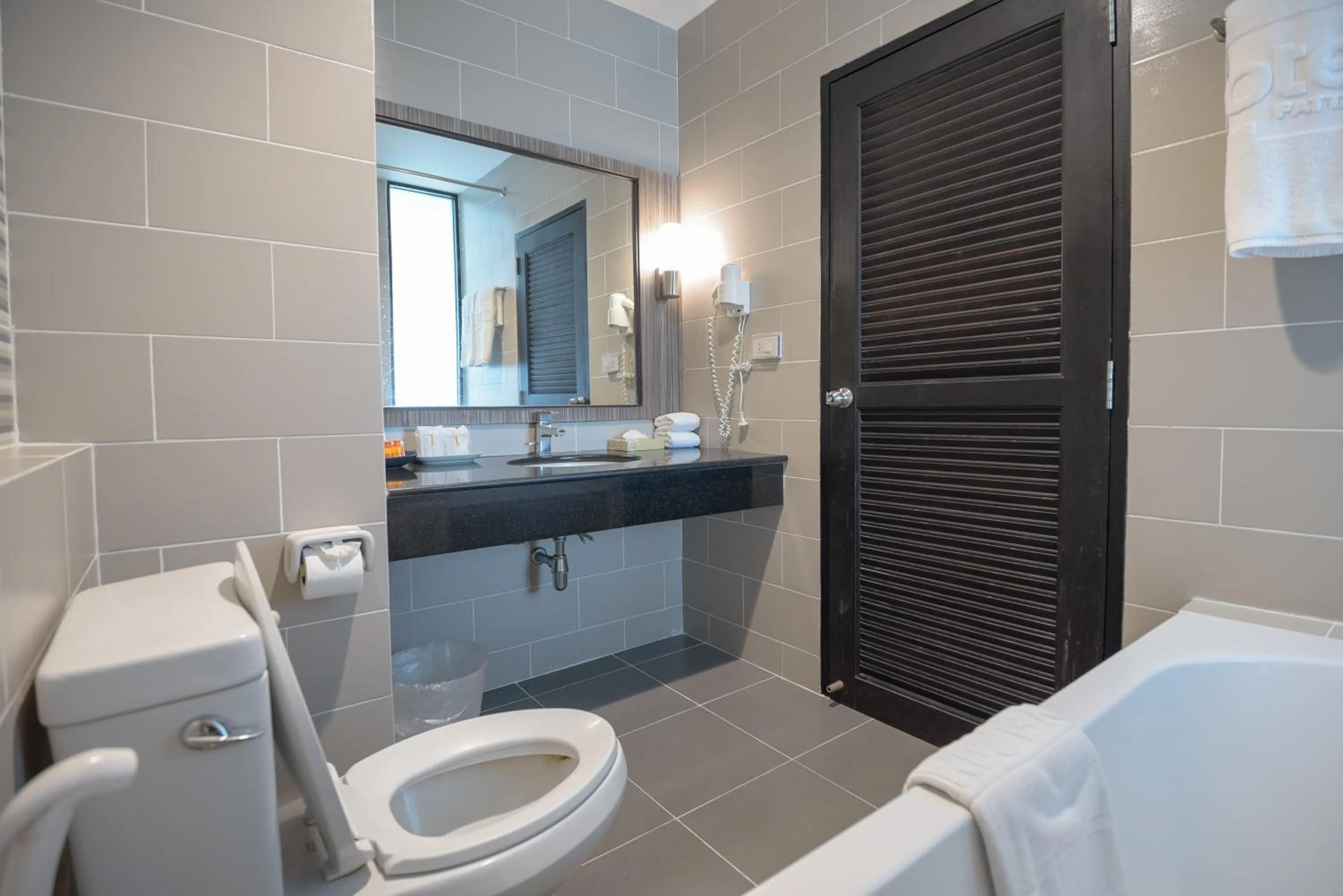 Bathroom in Hotel J Residence Pattaya