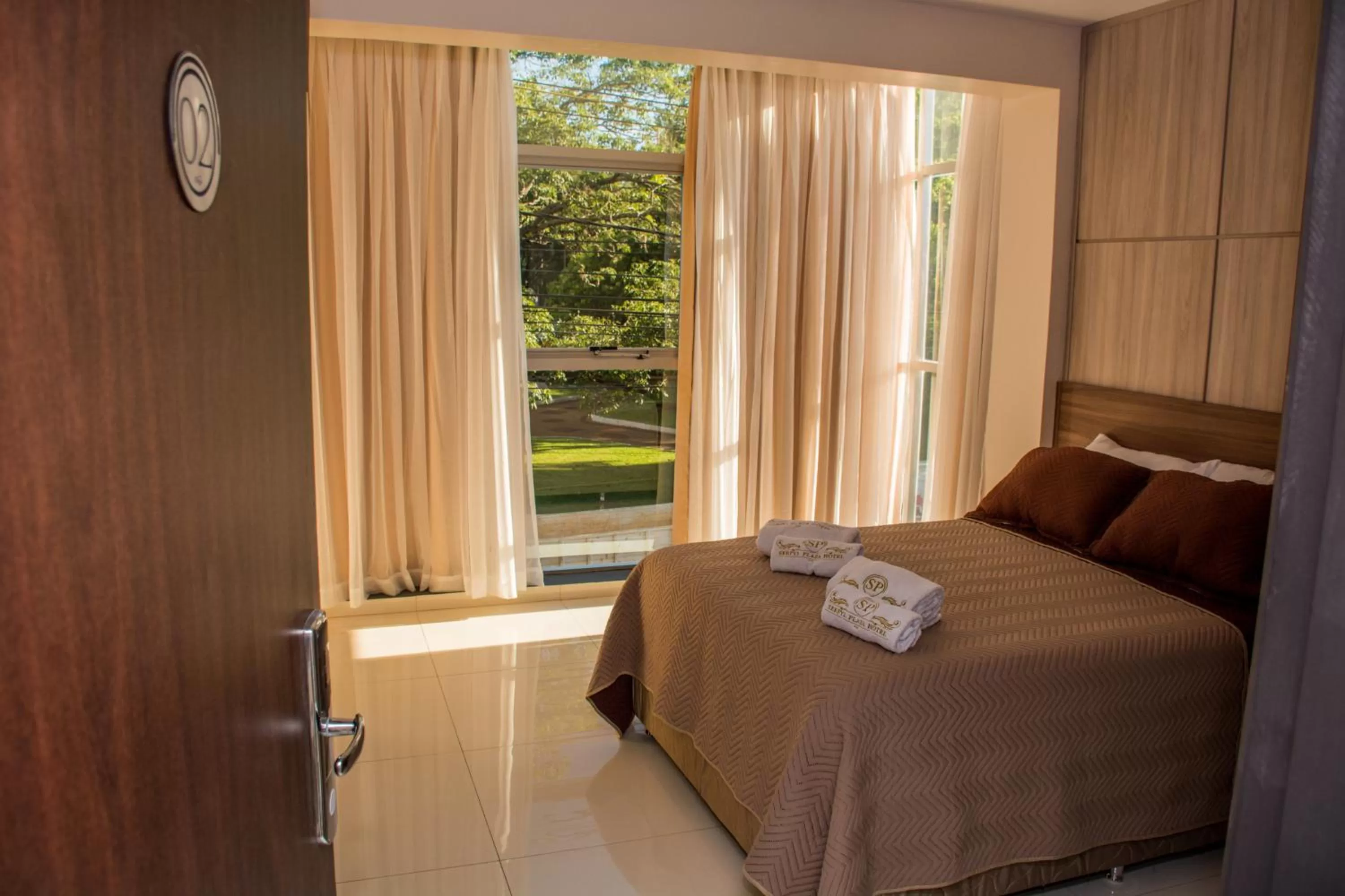 Bed in SERPYL Plaza Hotel