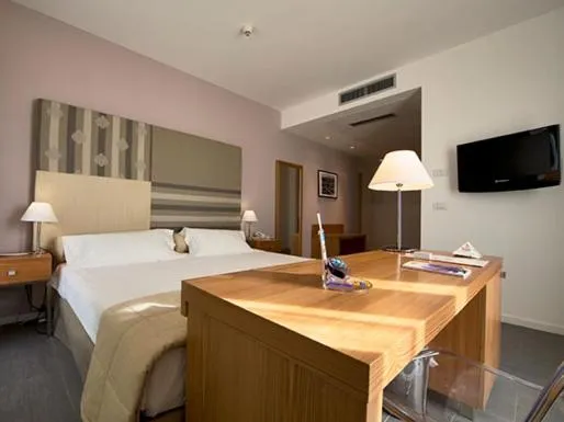 Photo of the whole room, Bed in Poggio Del Sole Hotel