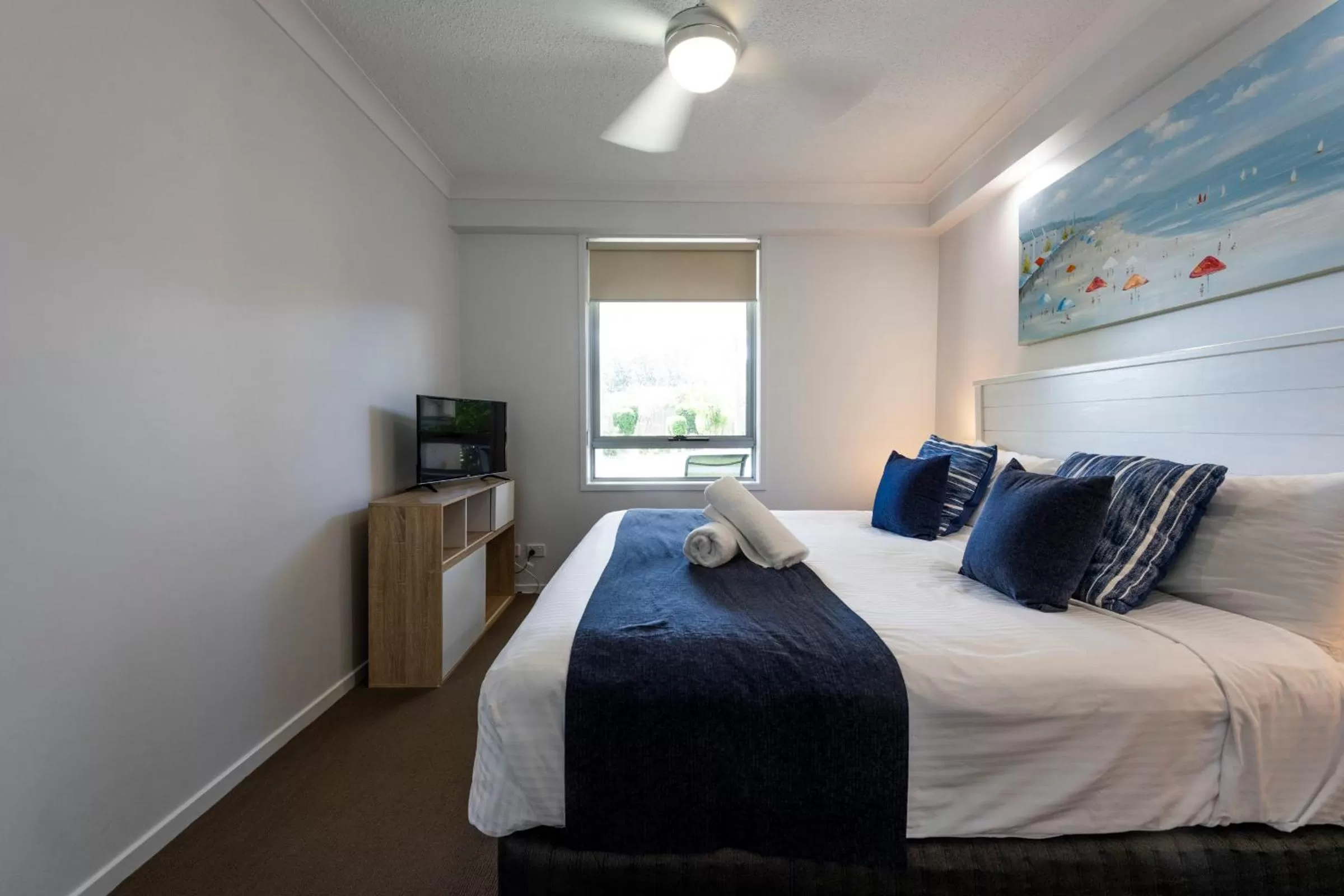 Bed in Pacific Marina Apartments