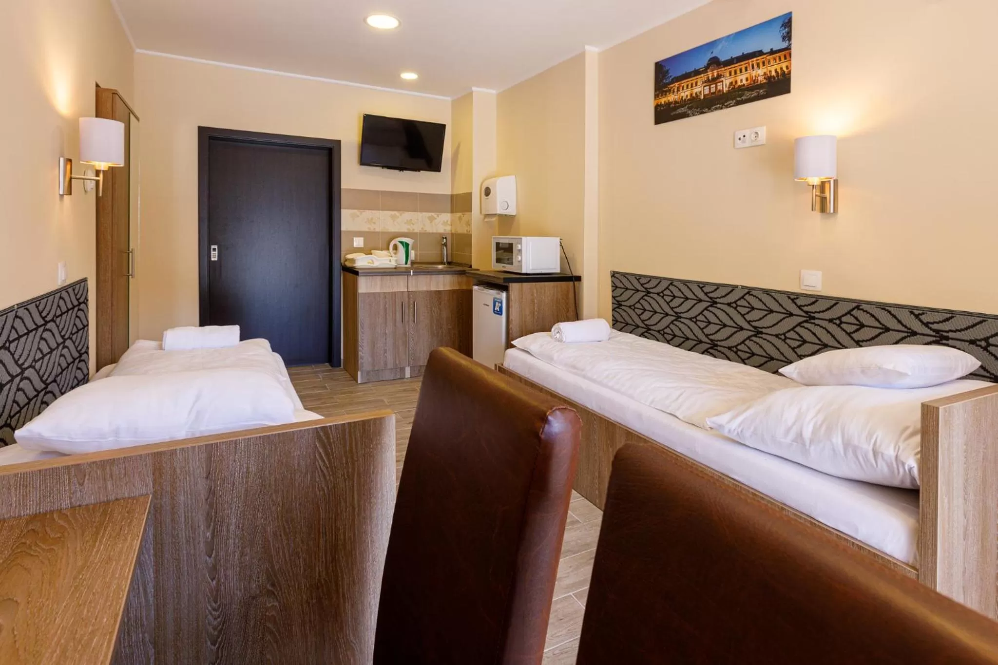 Bed in Central Panzió Gyula