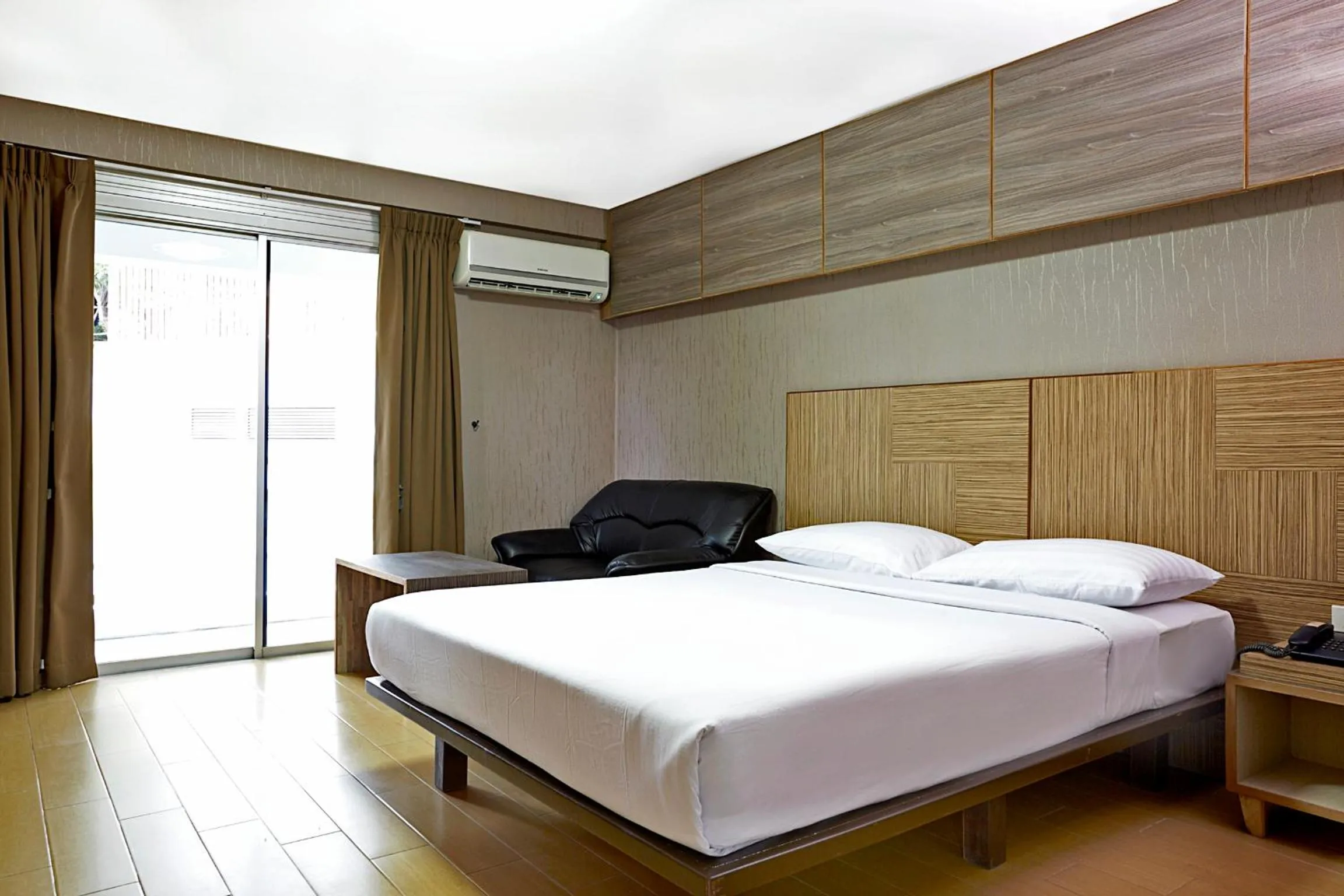 Bed in Watana Hotel