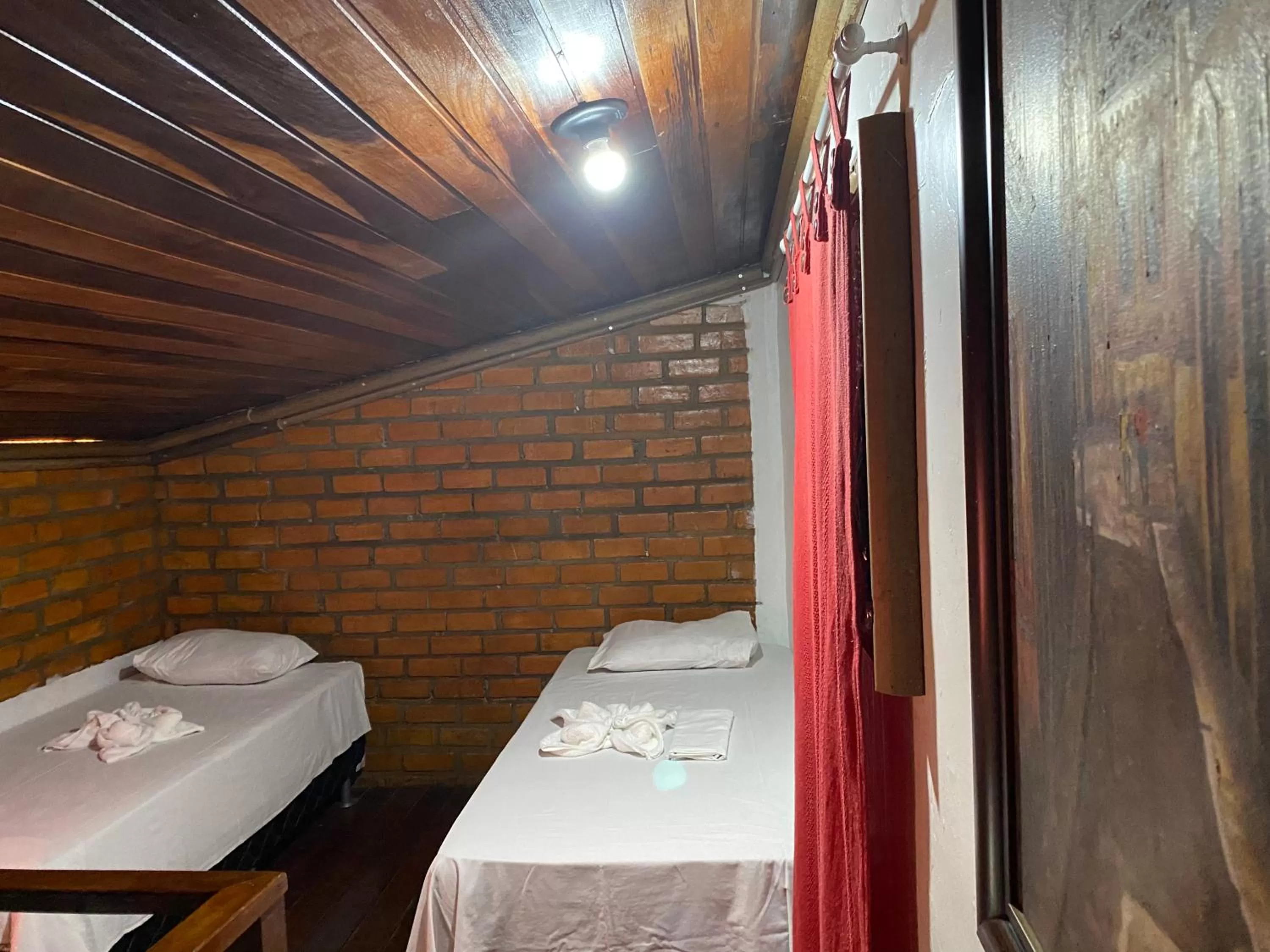 Bed in Pousada Vitória do Lopes