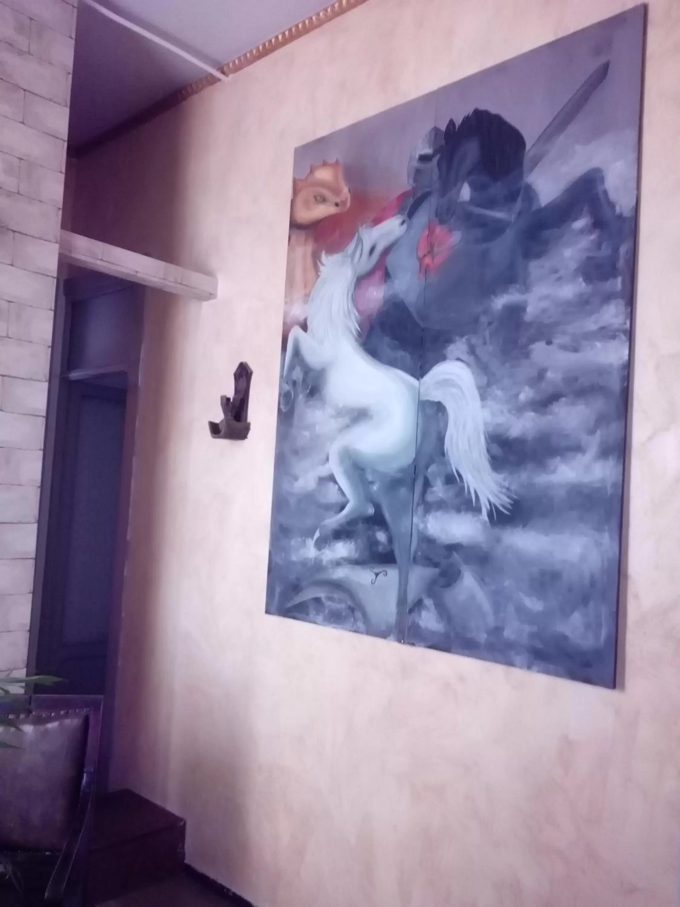 Communal lounge/ TV room in B&B Camelot